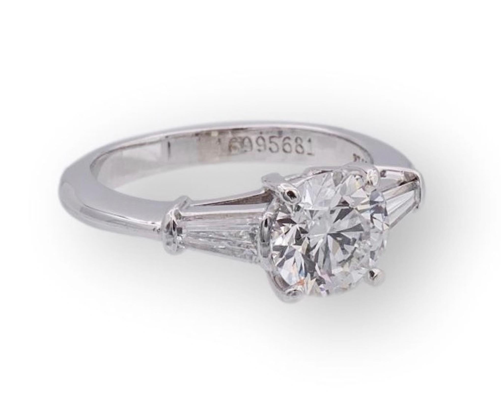 tiffany three stone engagement ring with baguette side stones in platinum