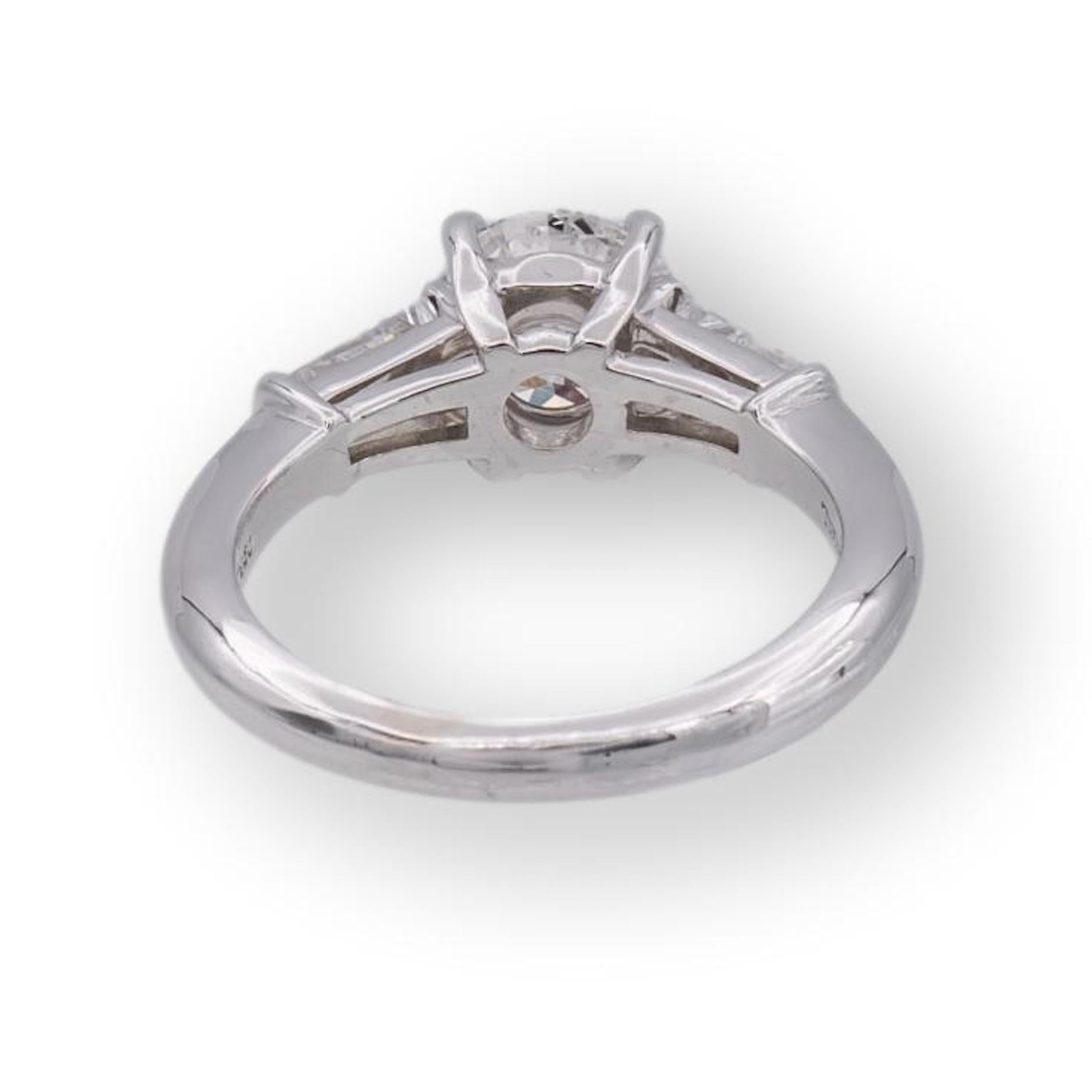 Contemporary Tiffany & Co. Platinum Round Three Diamond Engagement Ring w/Baguettes 1.33 FVS1