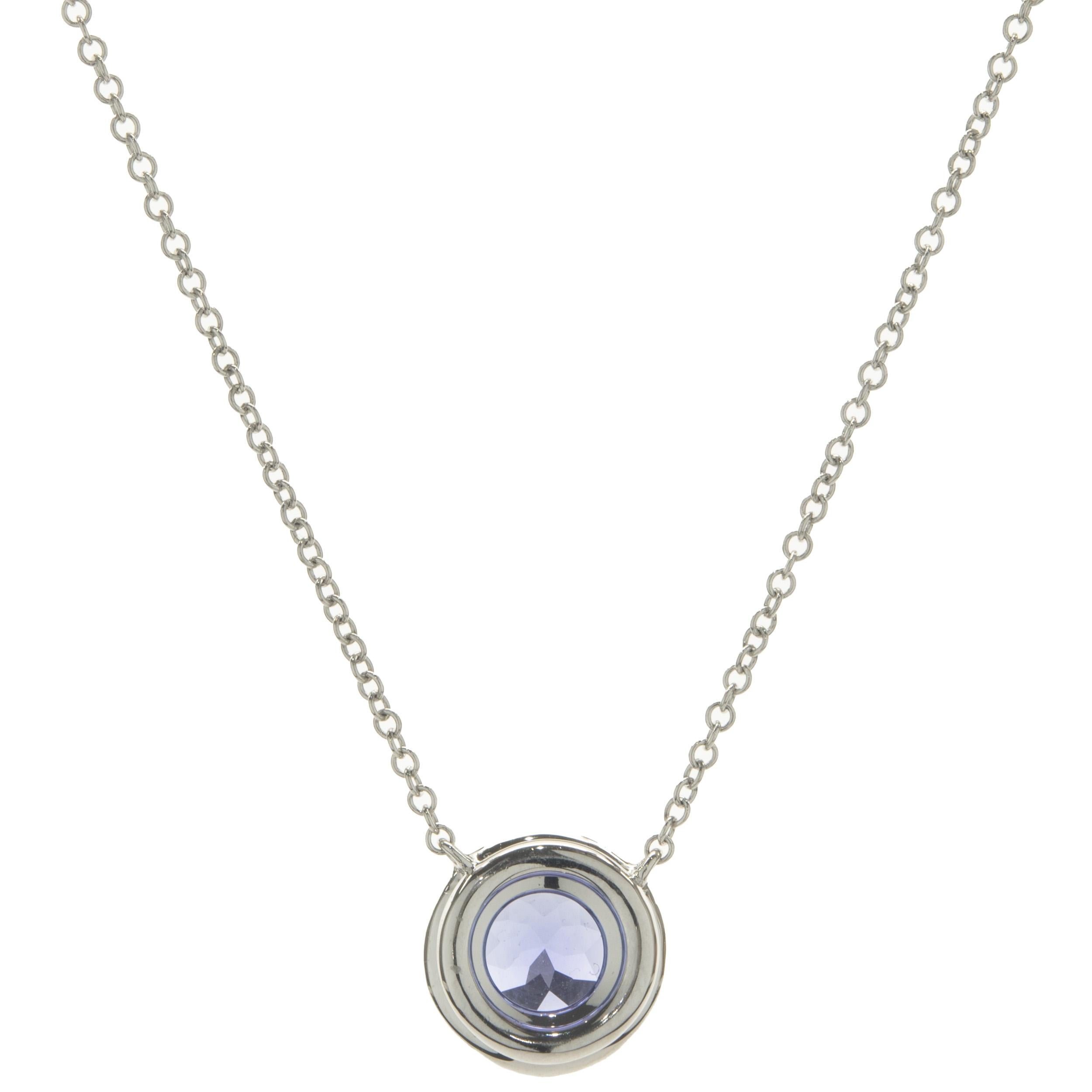 Designer: Tiffany & Co. 
Material: platinum
Diamond: round brilliant cut = 0.09cttw
Color: G
Clarity: VS2
Sapphire: 1 round cut = .40ct
Dimensions: necklace measures 16-inches 
Weight: 3.83 grams