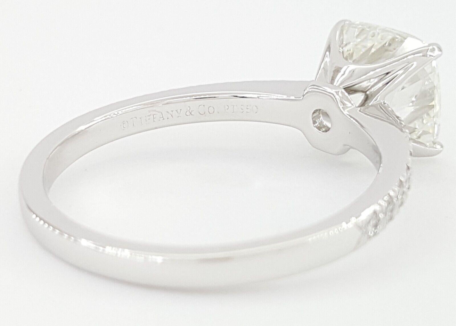 Modern Tiffany & Co. Platinum Soleste Diamond Halo Engagement Ring and Wedding Band For Sale