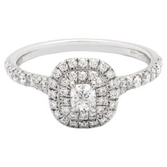 Tiffany
Co. in platino Soleste con doppio diamante aureolato anello