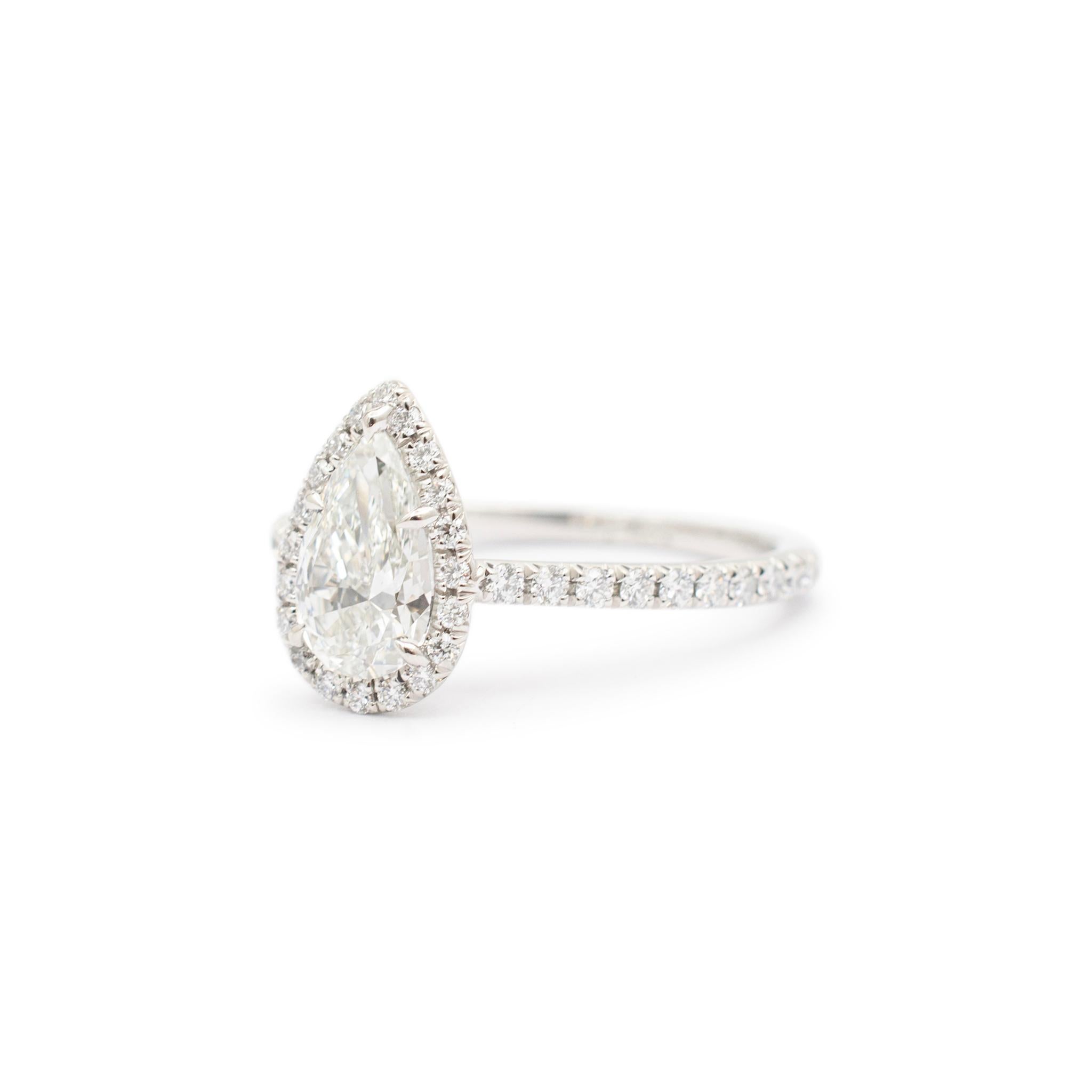tiffany soleste pear-shaped halo engagement ring with a diamond platinum band