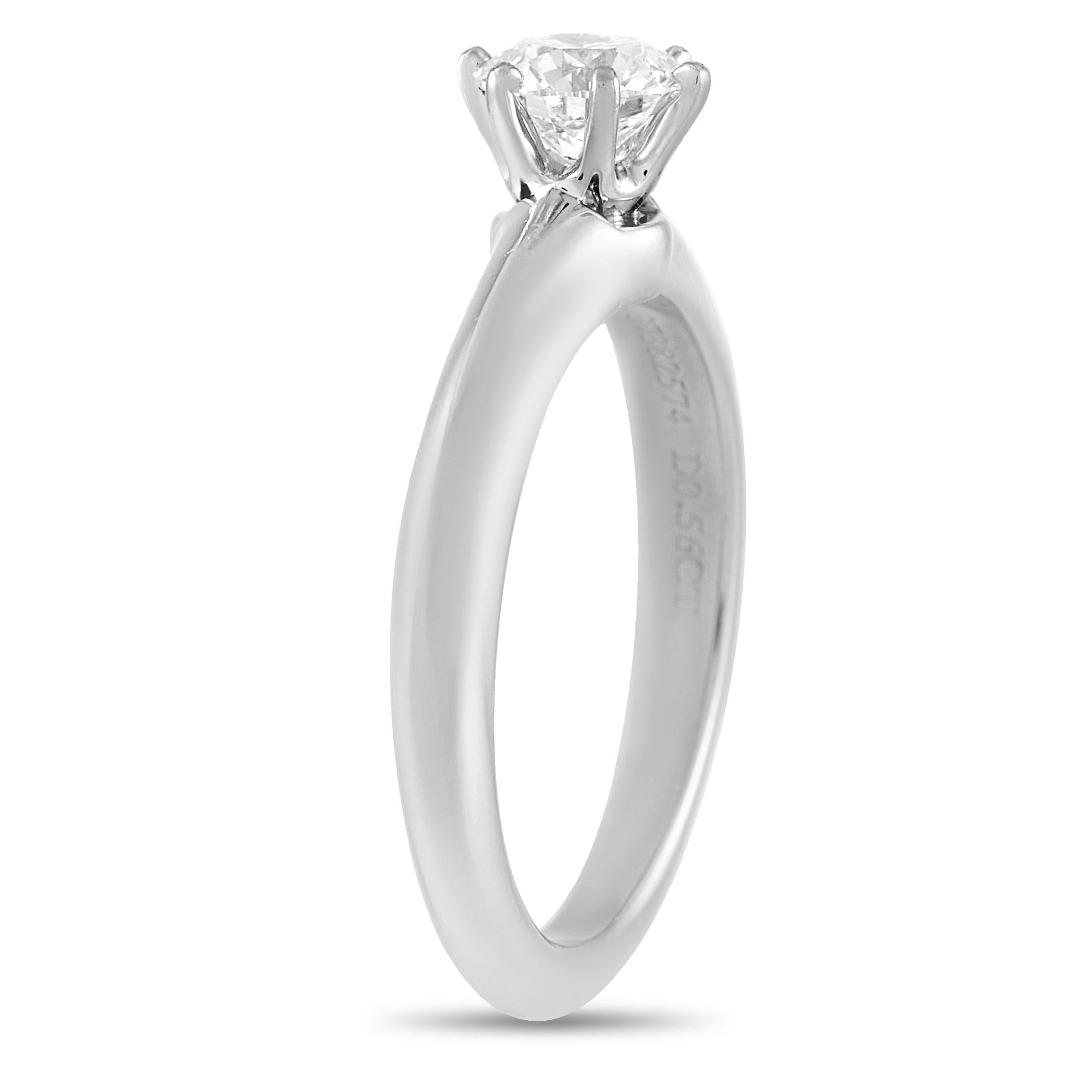 This Tiffany & Co. ring is simple but exceptional. It’s made from platinum and set with brilliant-cut a center diamond stone that features I color and VS1 clarity. The ring weighs 5.4 grams with a band thickness of 2mm, a top height of 6mm, and