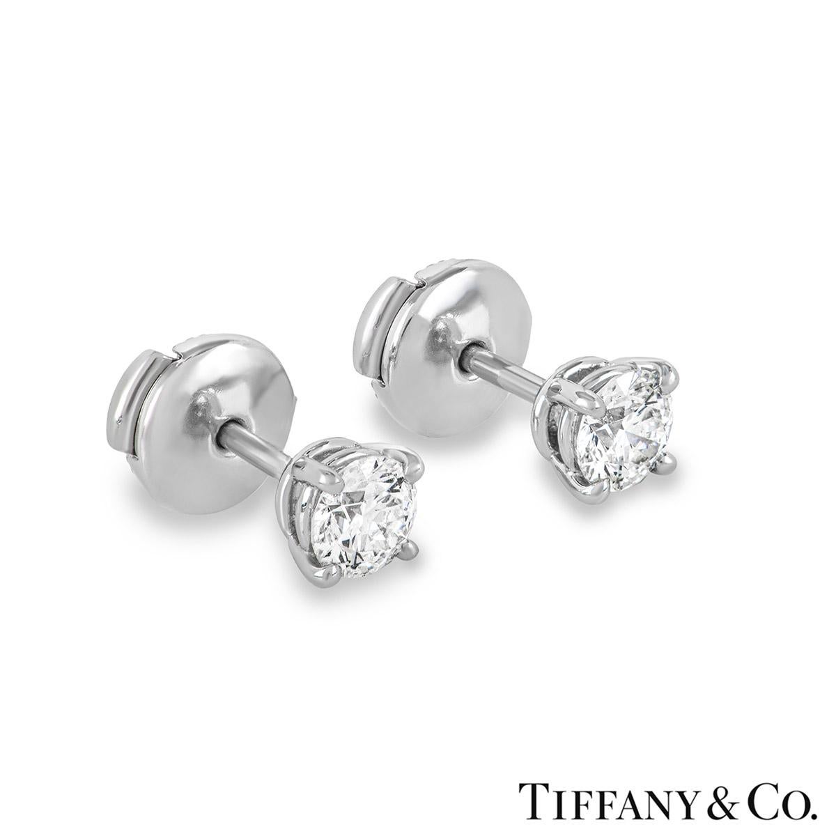 Contemporary Tiffany & Co. Platinum Solitaire Diamond Stud Earrings 0.82ct TDW XXX