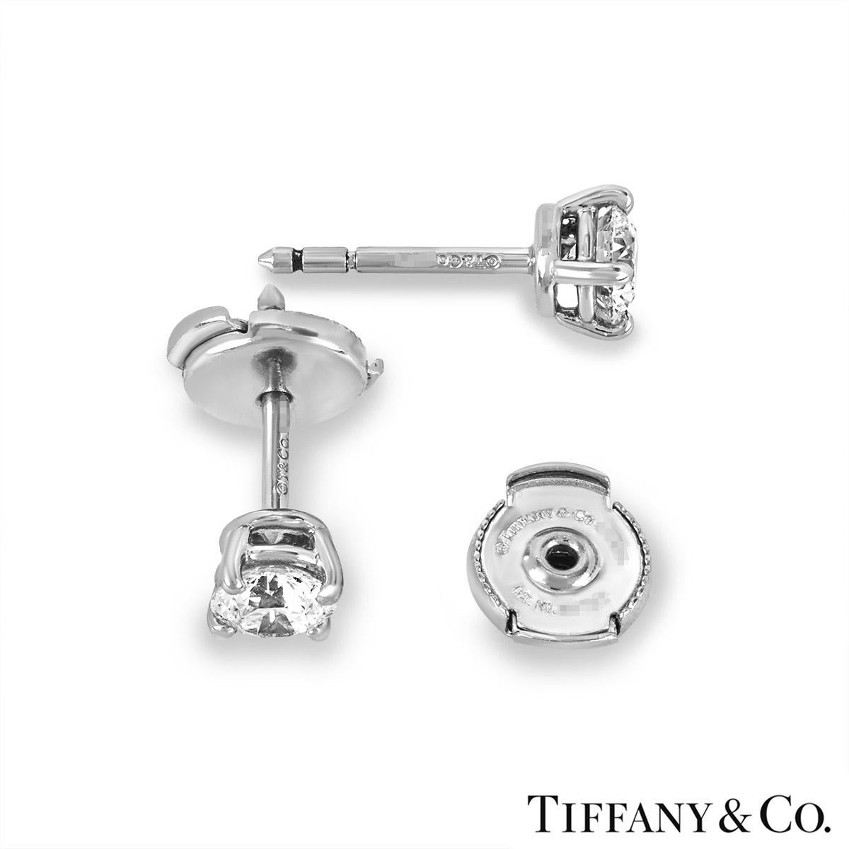 Round Cut Tiffany & Co. Platinum Solitaire Diamond Stud Earrings 0.82ct TDW XXX