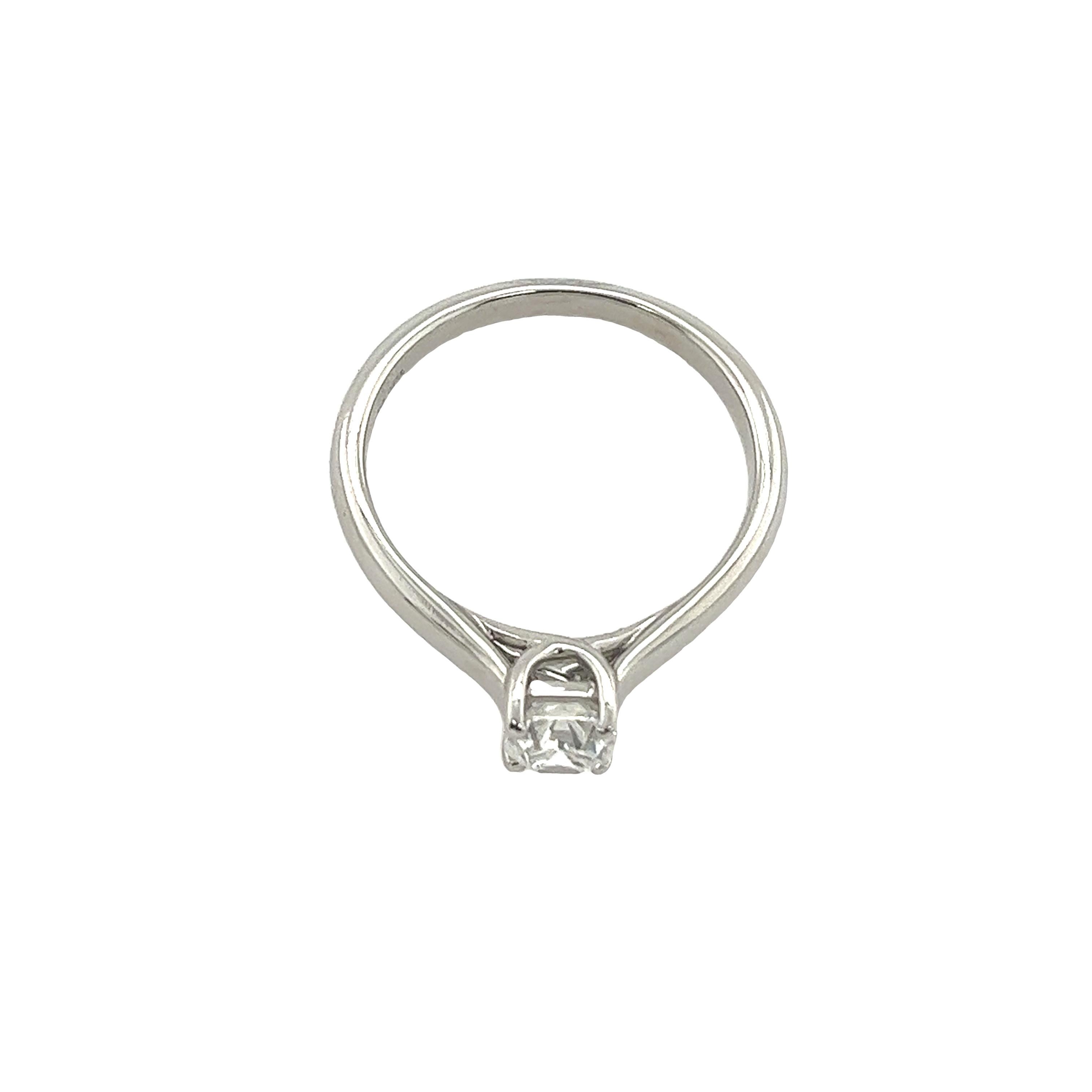 Tiffany & Co. Platinum Solitaire Engagement Ring, Set with 0.52ct E/VVS2 Diamond In Excellent Condition For Sale In London, GB