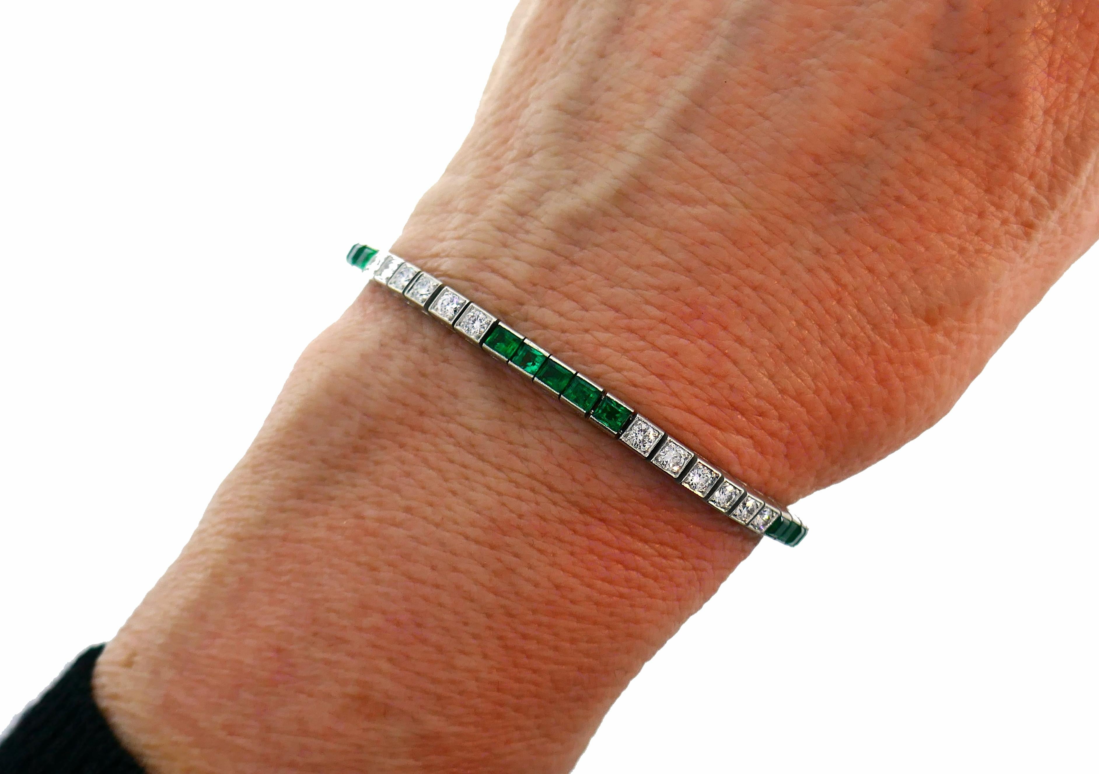 Classic tennis bracelet created by Tiffany & Co. in the 1960s. 
Made of platinum and set with round brilliant cut diamonds (G-h color, VS clarity, total weight approximately 1.80 carats) and table cut emeralds (total weight approximately 3.25