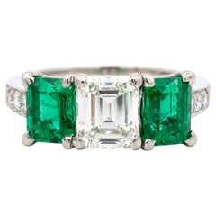 Tiffany & Co Platinum Three Stone Ring with Emeralds and 1.30ct VS1 Diamond