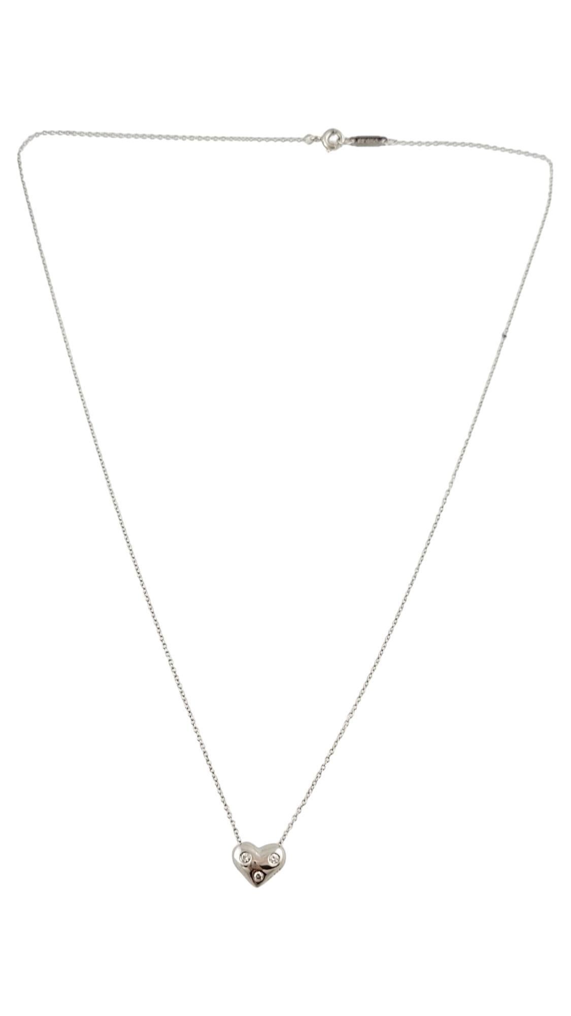 Tiffany & Co. Platinum Tiffany Diamond Etiole Heart Necklace

This beautiful necklace by designer Tiffany & Co. was crafted by sterling silver and features a heart pendant with 3 sparkling round brilliant cut diamonds!

Approximate total diamond