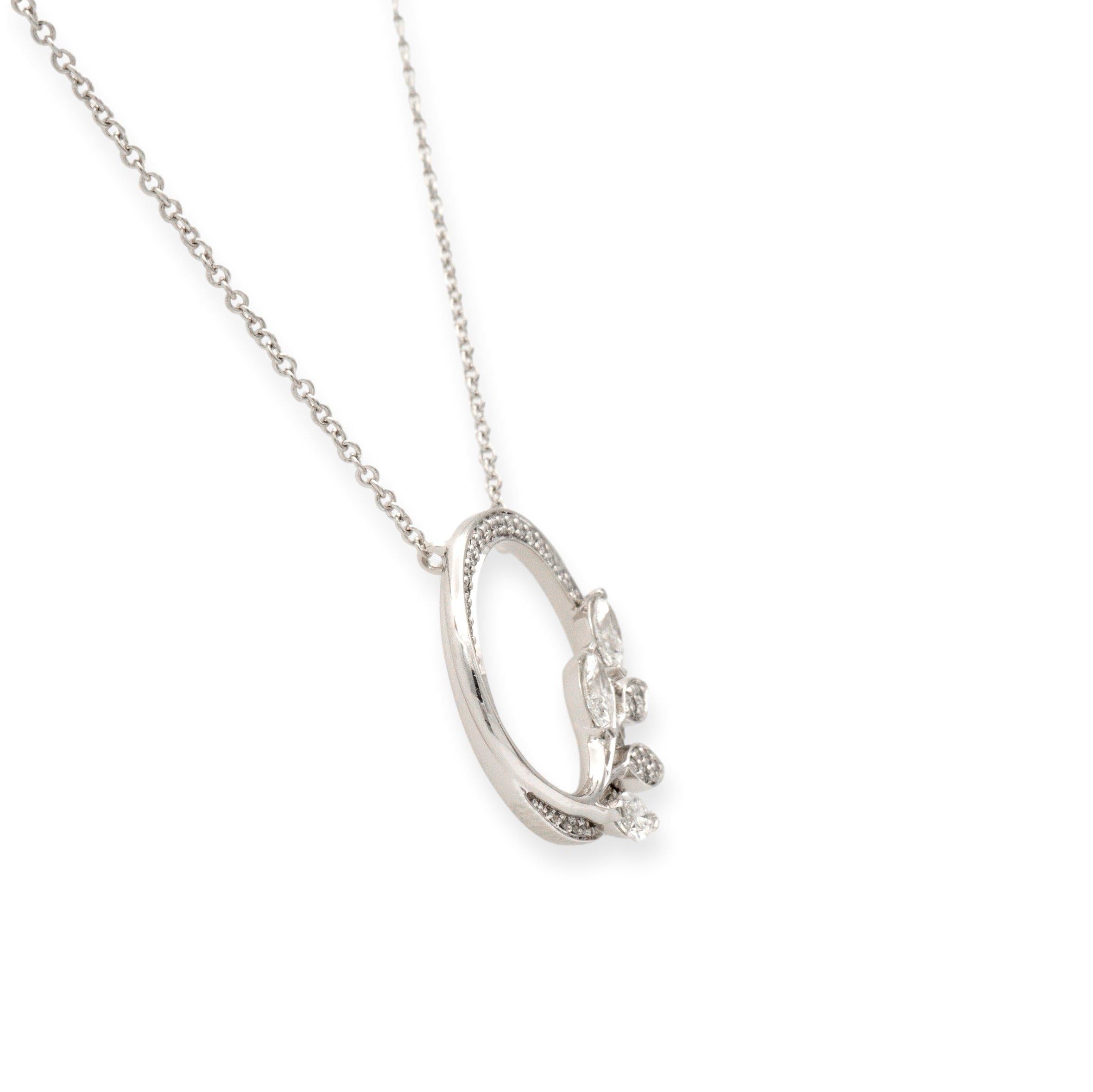 Introducing the epitome of elegance and grace - the Tiffany & Co. pendant necklace from the Vine Victoria collection. Meticulously crafted in lustrous platinum, this exquisite piece boasts a harmonious blend of marquise and round brilliant cut