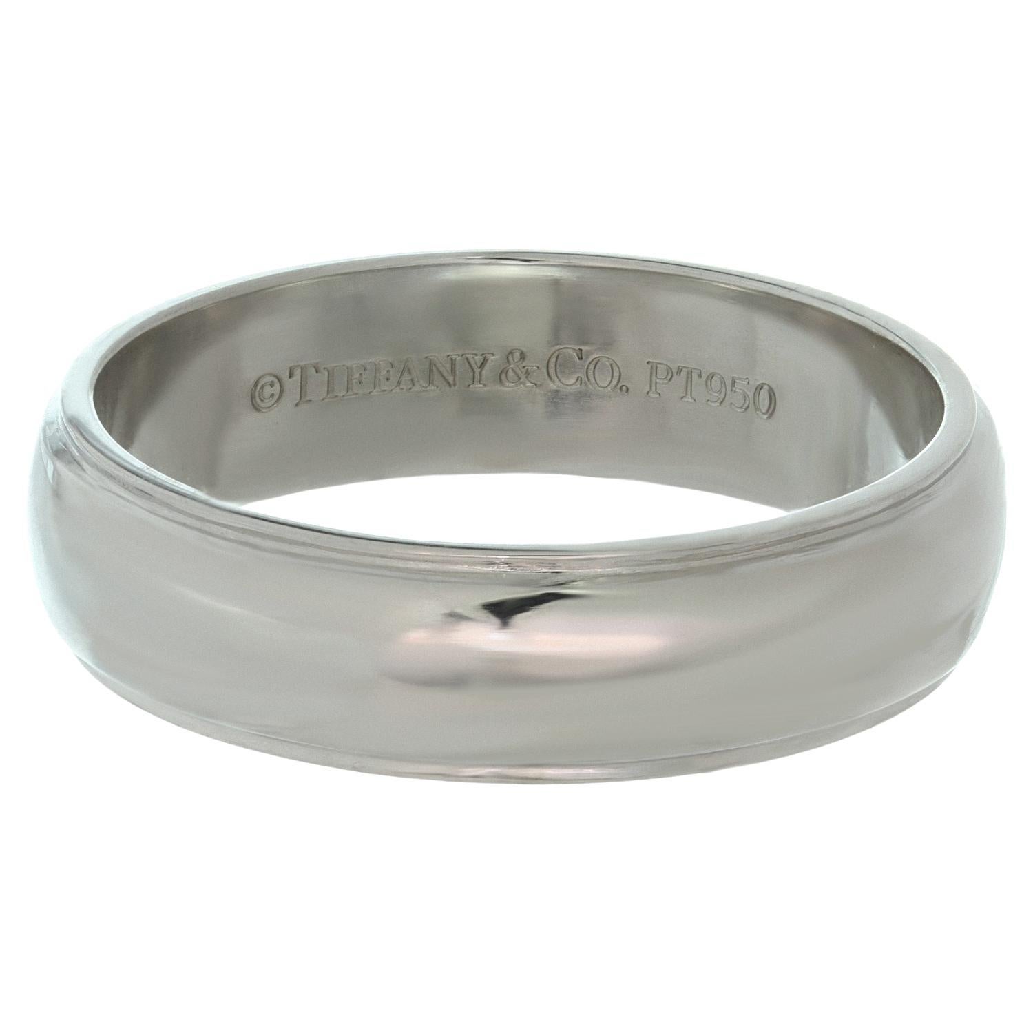 This classic Tiffany & Co. wedding band is crafted in 950 platinum and measures 6.0mm in width. Made in United States circa 2010s. Measurements: 0.23