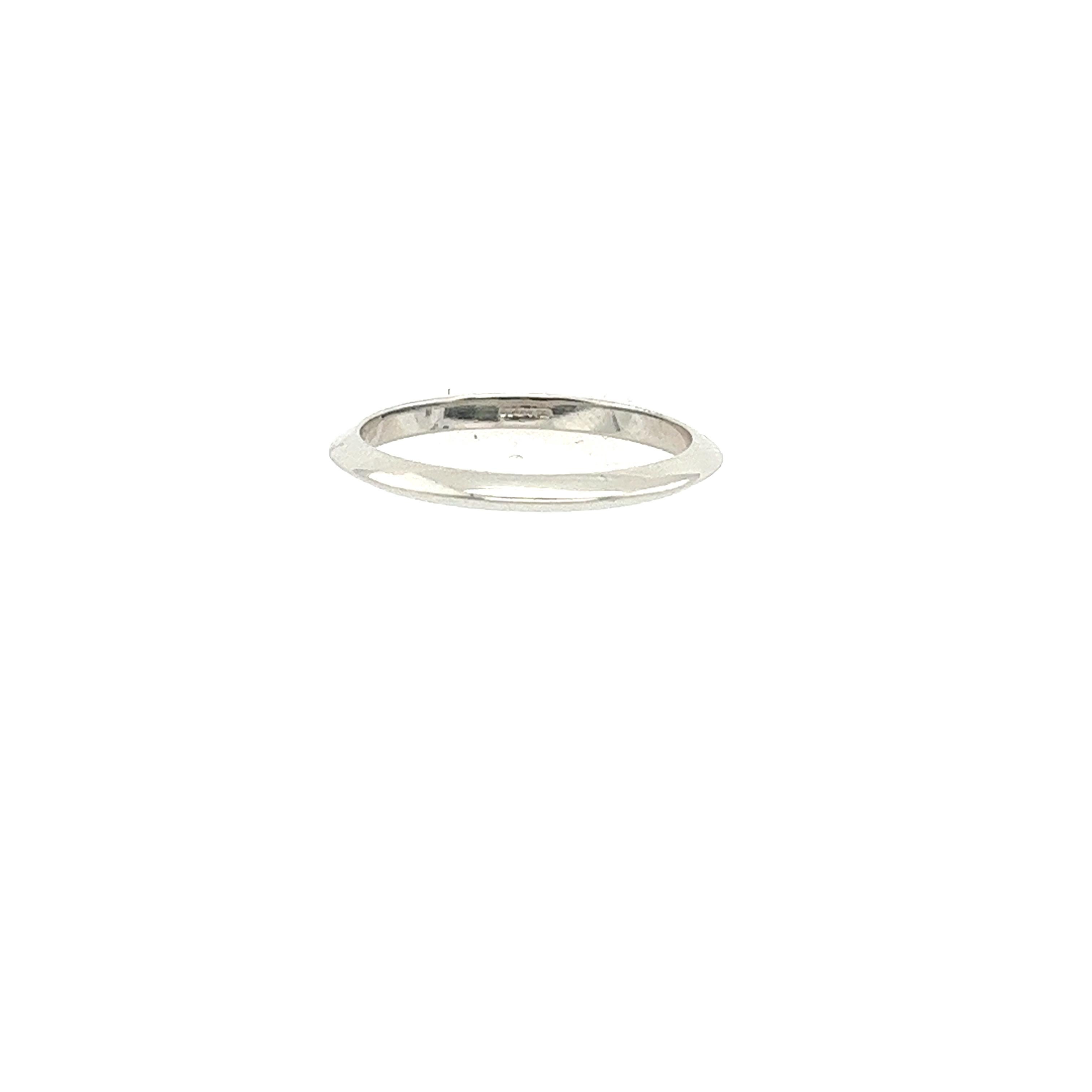 
A Tiffany & Co. platinum wedding band is a symbol of enduring love and commitment. Tiffany & Co. wedding bands feature timeless designs that complement any style or aesthetic. 

Width of Band: 1.75mm
Total  Weight: 2.06g
Ring Size: I1/2
Please note