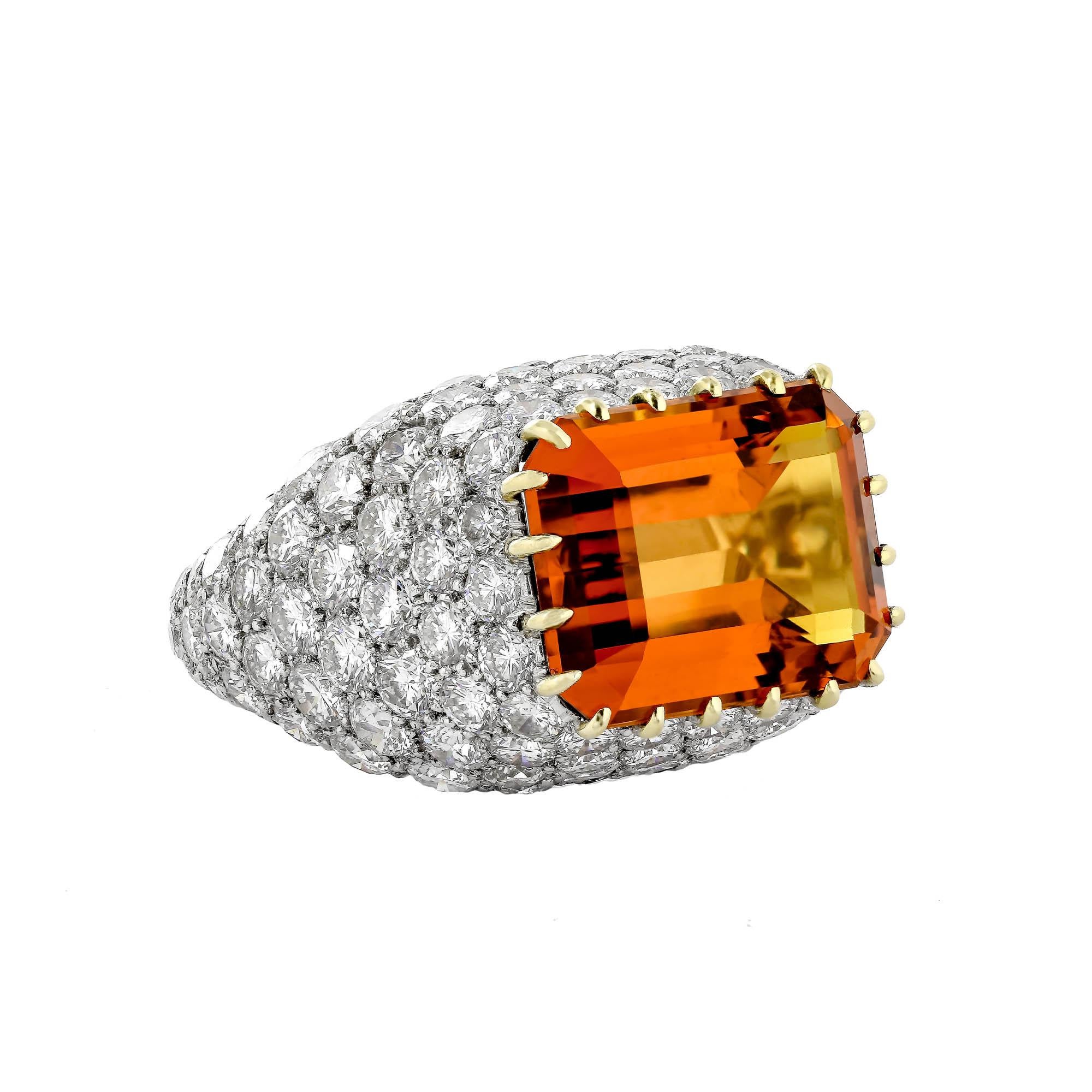 Stunning Tiffany & Co 8.00 carat yellow topaz and diamond ring featuring one no-heat 8.00 carat yellow topaz (weight is approximate) set with round brilliant cut diamonds, circa 1980, size 7.



yellow topaz and diamond ring featuring an 8.00 Carat