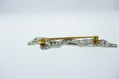 Tiffany & Co. Platinum, Yellow Gold and Diamond Bow Brooch Art Deco, circa 1920s