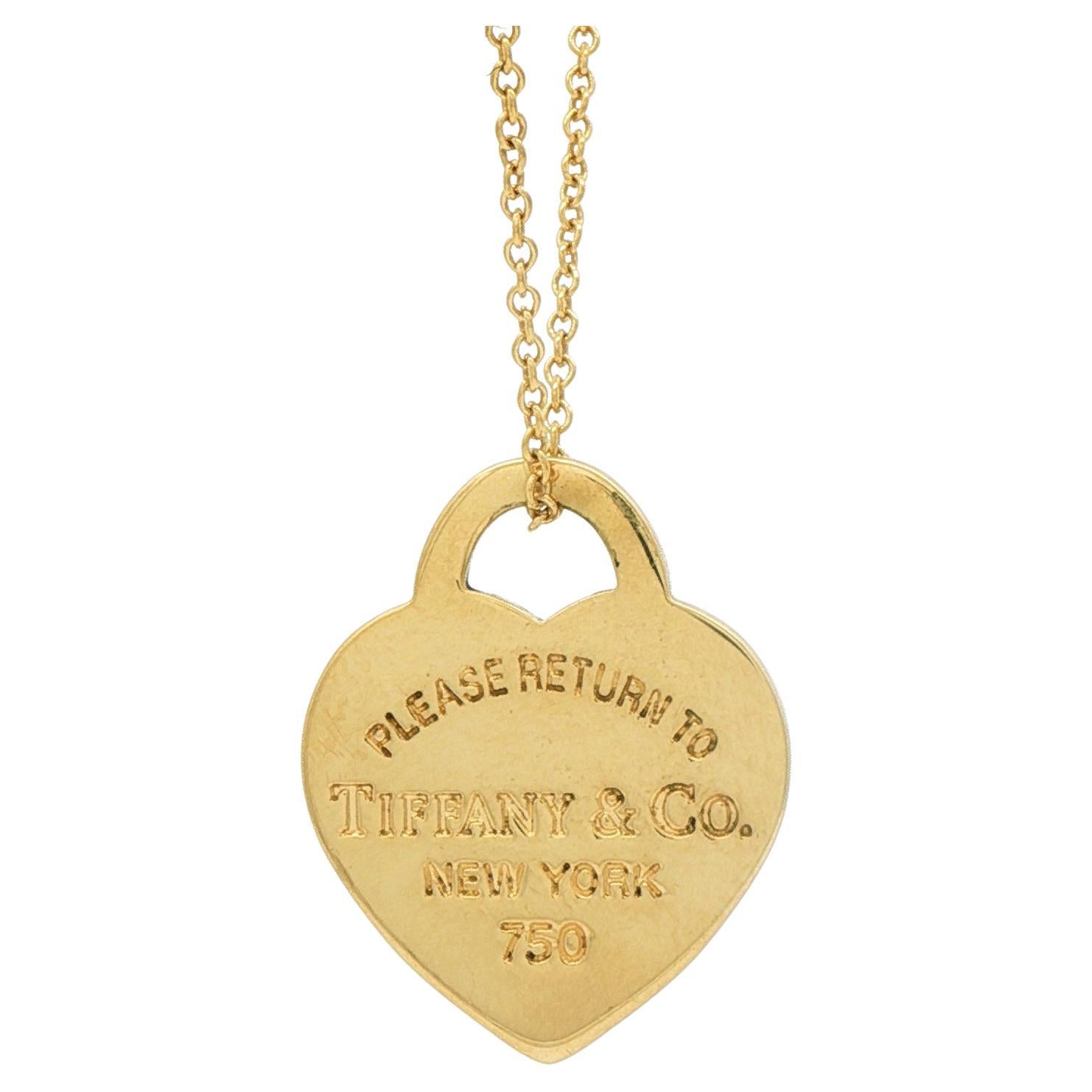Tiffany
Co. Please Return to Tiffany Gold Pendant