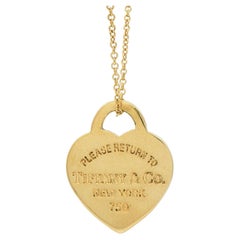 Tiffany
Co. Please Return to Tiffany Gold Pendant