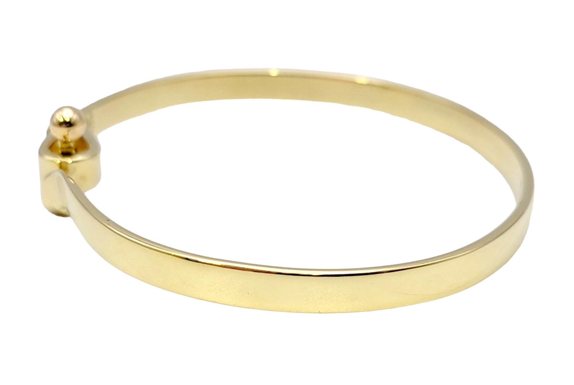 Women's or Men's Tiffany & Co. Polished 18 Karat Yellow Gold Hook and Eye Bangle Bracelet