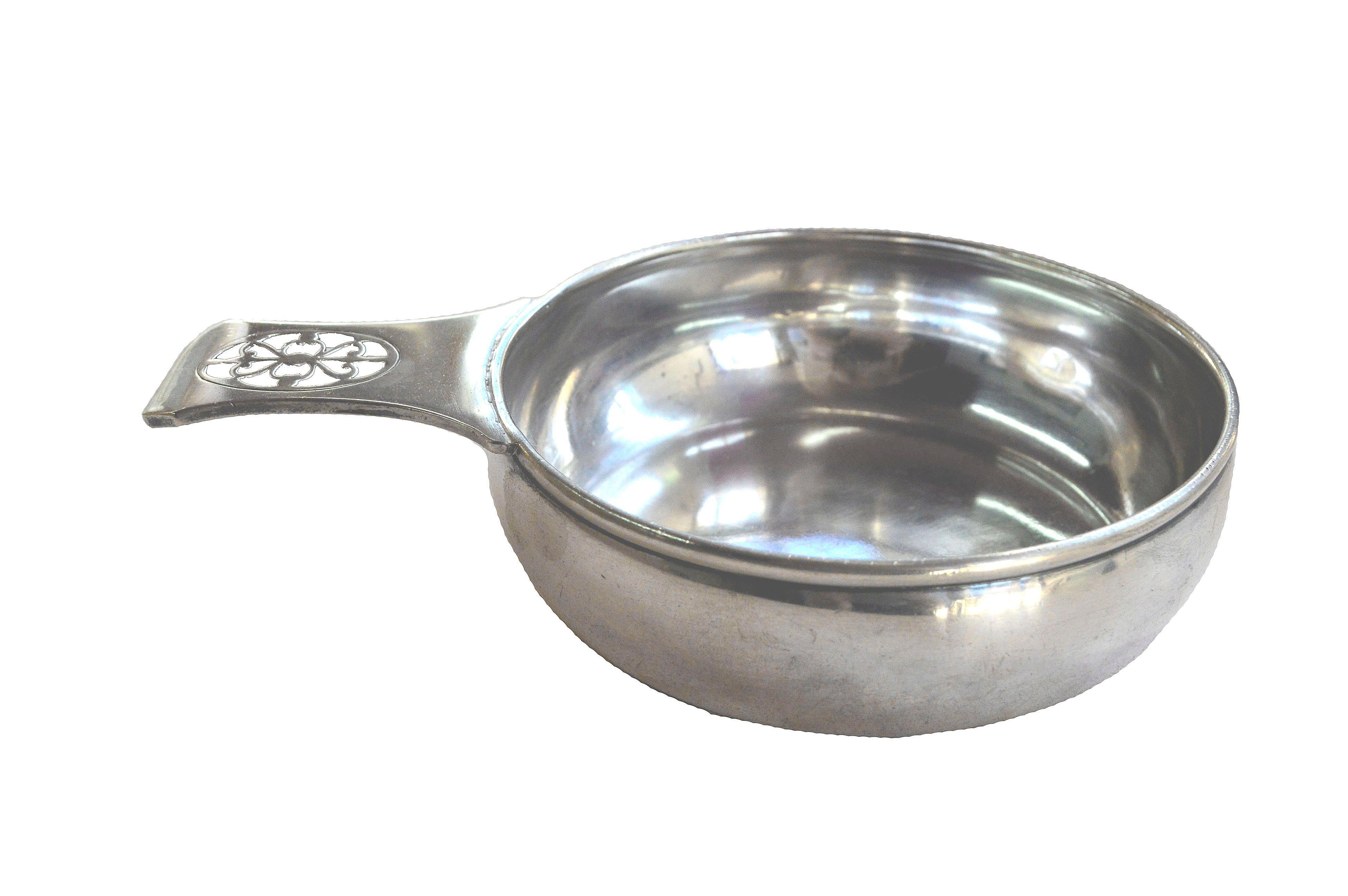 Early 20th Century Antique Tiffany & Co. Sterling Silver Porringer

Tiffany & Co. 10 ounce porringer, sterling silver, dated 1907-1938. Stamped on verso.