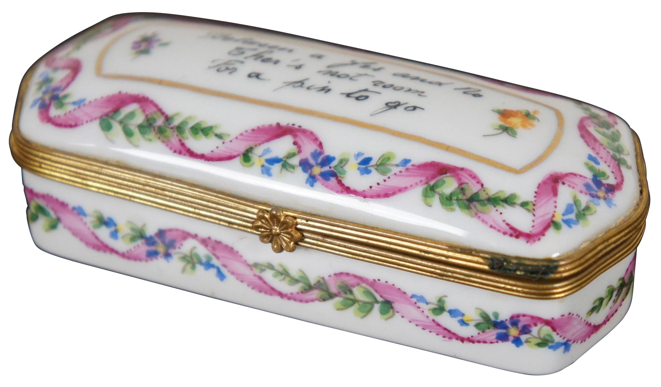 Vintage Tiffany & Company Private Stock hand painted rectangular Limoges trinket or pill box, numbered 136; white porcelain painted with a pink ribbon entwined with a blue flowered vine and the phrase “Between a Yes and No Ther’s Not Room for a Pin