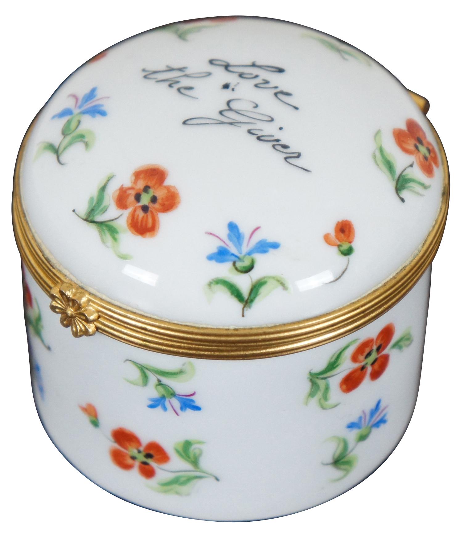 Vintage Tiffany & Company Private Stock hand painted round Limoges trinket or pill box, numbered 306; white porcelain with red-orange poppies, bluebells, and the phrase “Love the Giver.”
 