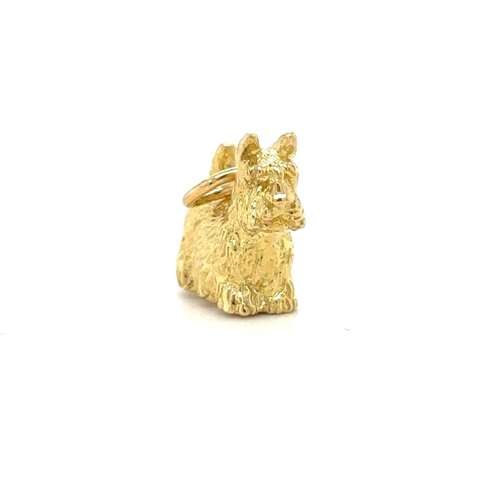 Tiffany & Co. Rare Vintage 18k Yellow Gold Scottish Terrier Dog Charm Pendant

Condition:  Excellent Condition, Professionally Cleaned and Polished
Metal:  18k Gold (Marked, and Professionally Tested)
Weight:  7.6g
Length:  .6