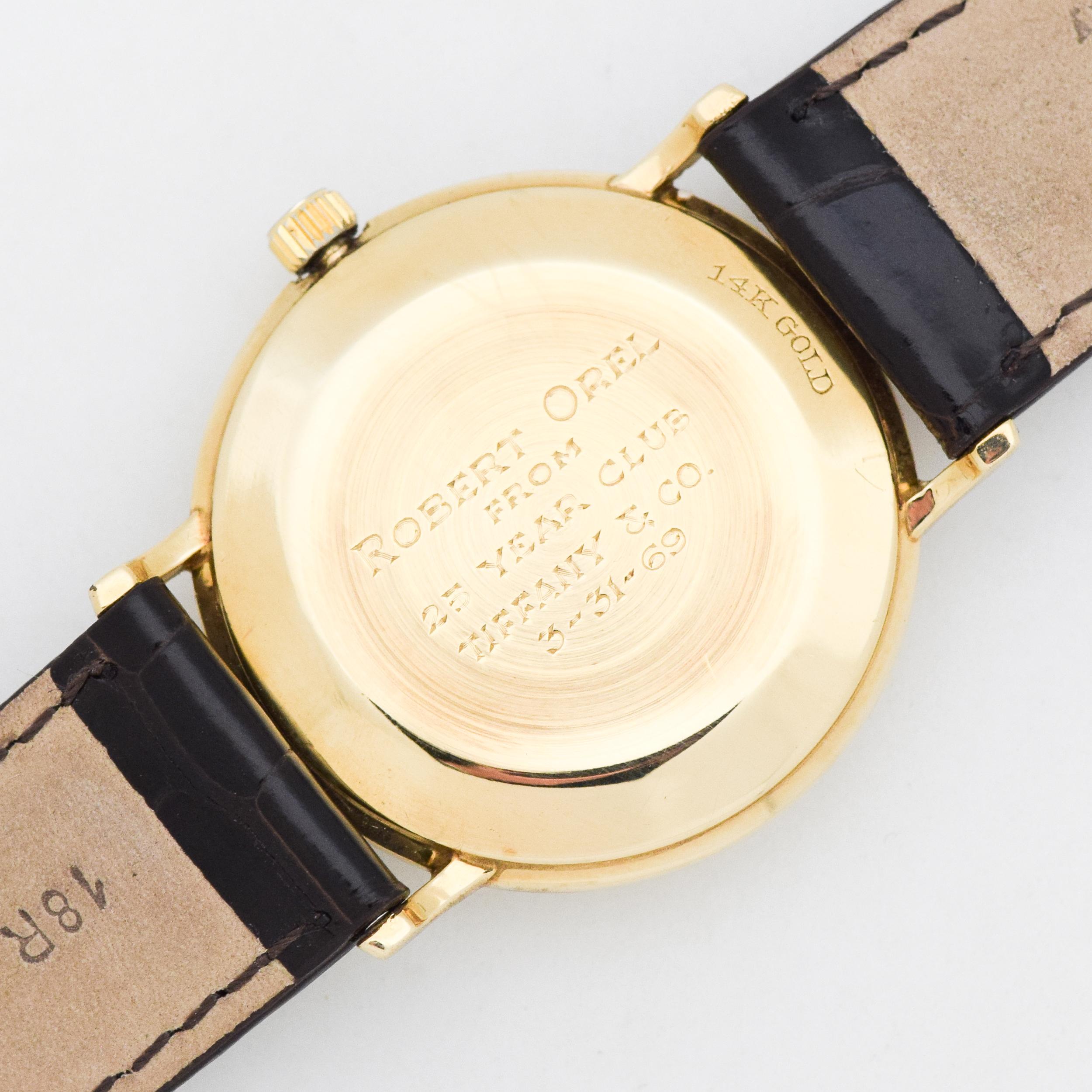 Women's or Men's Tiffany & Co. Reference T-101-C with a 14 Karat Yellow Gold Case, 1994 For Sale