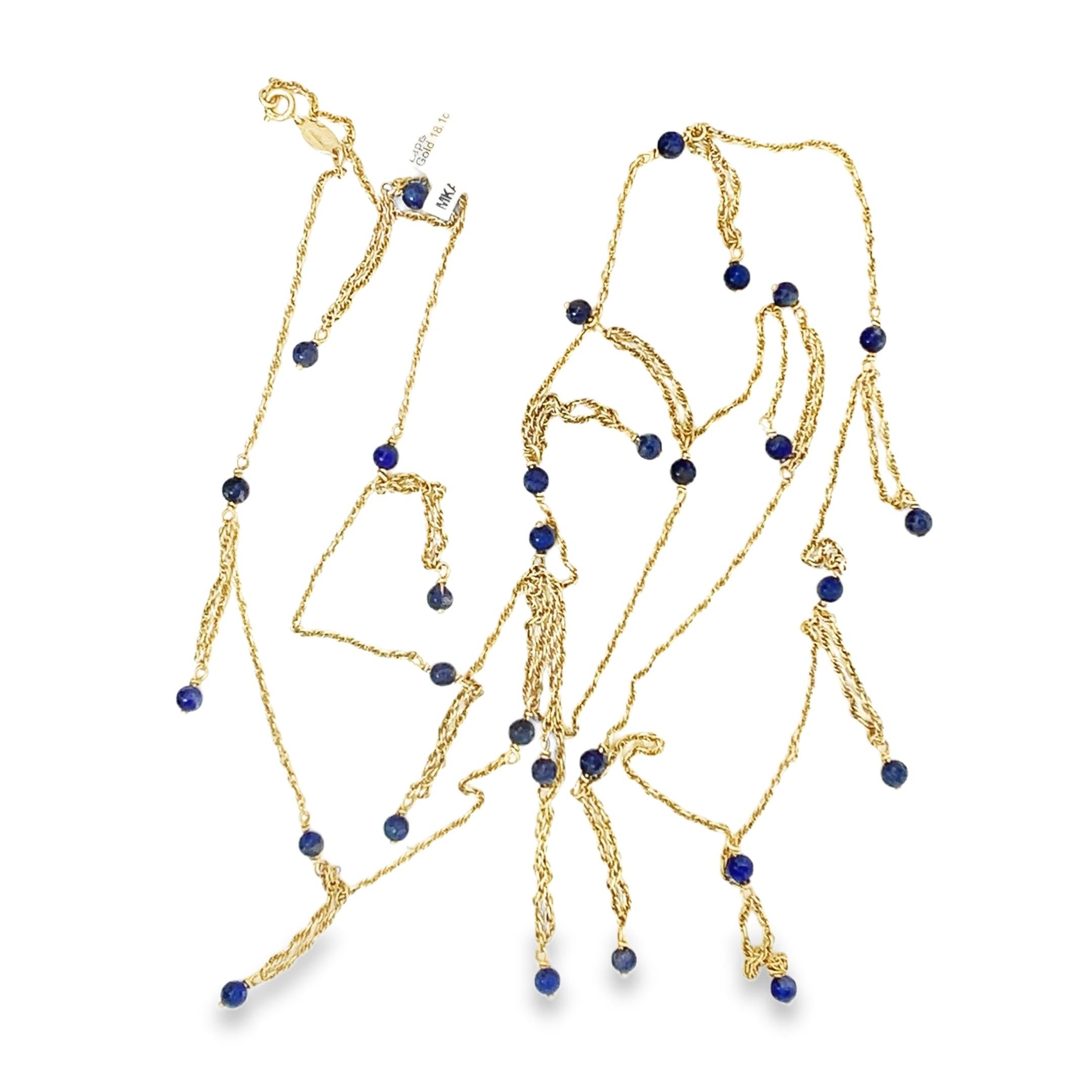 Tiffany & Co. Retro Vintage 14k yellow gold rope gold chain features a unique design with delicate gold chain tassels and blue lapis lazuli beads. The tassels are 1.25 inches in length and stationed every 2 inches. The total length of the necklace
