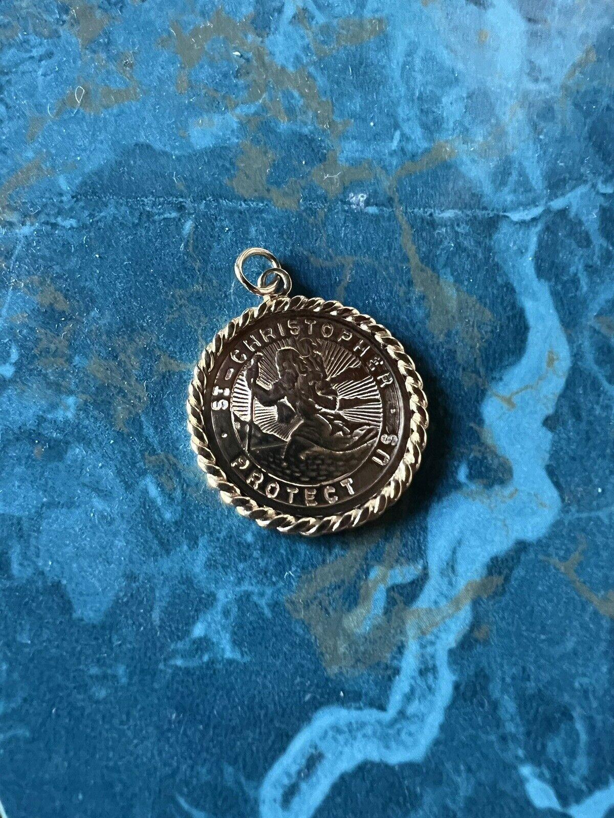 Tiffany & Co. Retro 14k Yellow Gold Saint Christopher Charm Pendant Circa 1950s

Here is your chance to purchase a beautiful and highly collectible designer charm pendant.  

The weight is 3.5 grams and the length with bail is 1 1/8 inches.  The