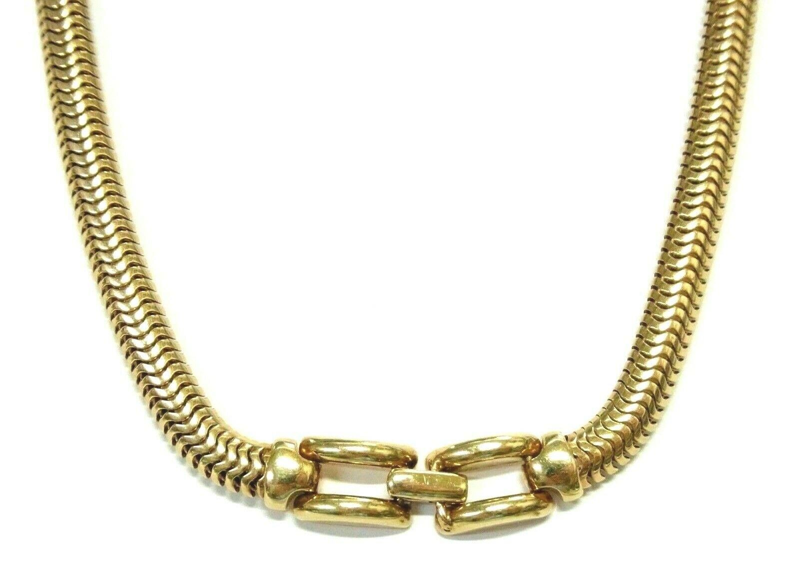 Tiffany & Co. Retro 14k Yellow Gold Snake Chain Necklace Circa 1940s





Here is your chance to purchase a beautiful and highly collectible designer necklace.  Truly a great piece at a great price! 



Weight: 34.8 grams



Condition: