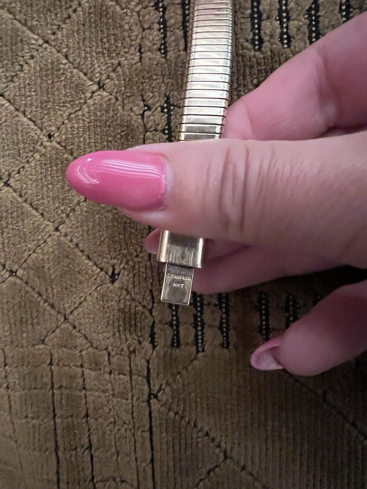 Tiffany & Co. Retro Tubogas 14k Gelbgold Choker Halskette 1950s

Hier haben Sie die Chance, eine wunderschöne Designer-Halskette mit hohem Sammlerwert zu erwerben. Wirklich ein tolles Stück zu einem tollen Preis! 

Einzelheiten:

Die Halskette ist