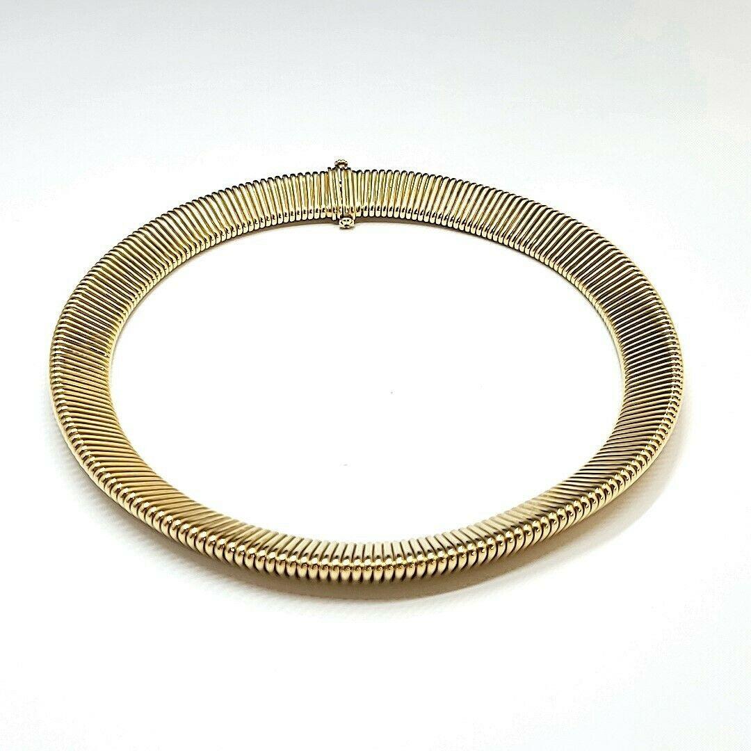 Tiffany & Co. Retro 14k Yellow Gold Tubogas Choker Necklace Circa 1950s

Here is your chance to purchase a beautiful and highly collectible designer necklace.  Truly a great piece at a great price! 

The length is 15 inches.  The weight is 91.1