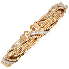 Tiffany & Co. Retro 1940s Gold and Diamond Twisted Gas Pipe Bracelet