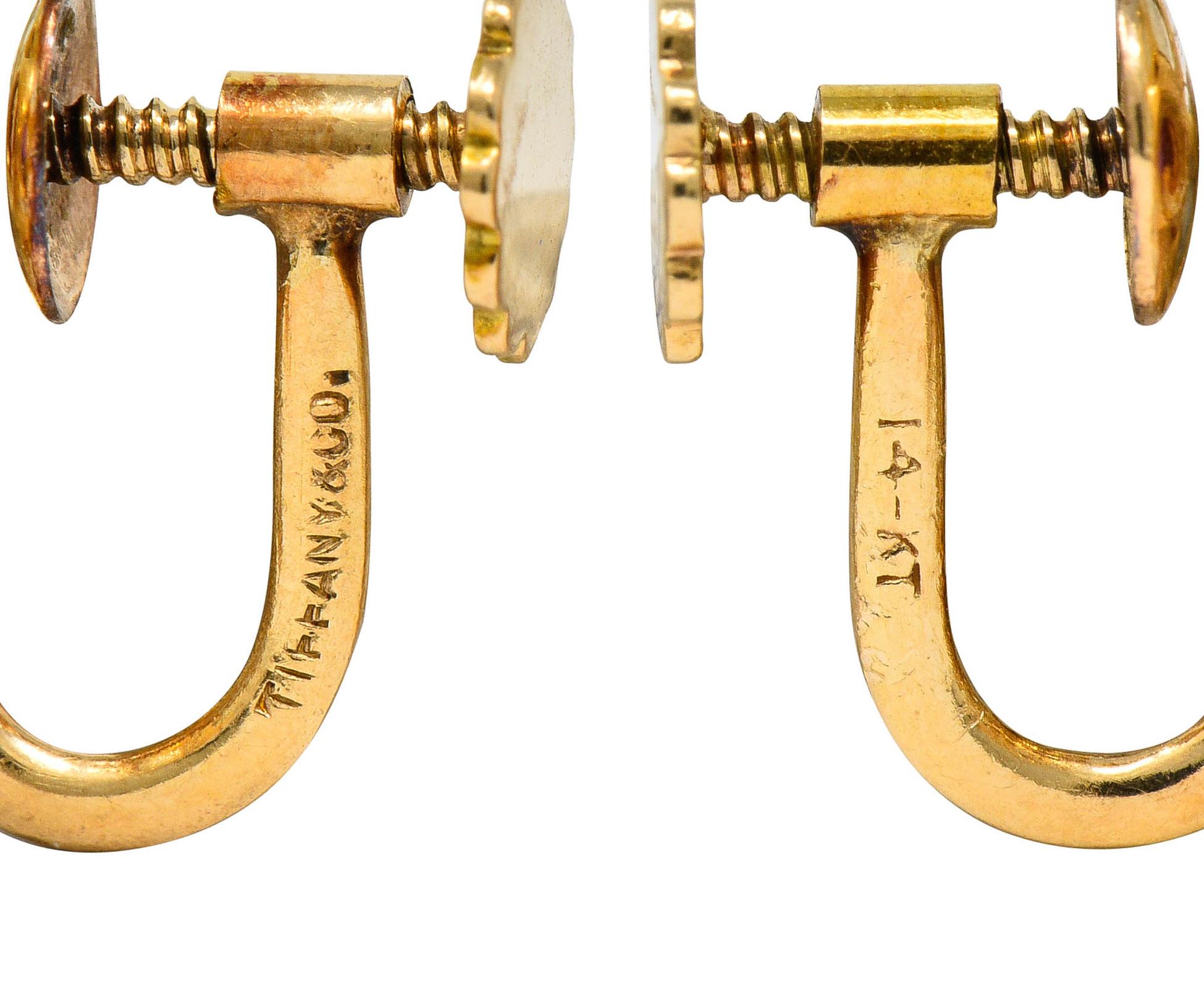 Tiffany & Co. Retro 6.20 Carat Aquamarine Ruby 14 Karat Gold Flower Earrings In Excellent Condition In Philadelphia, PA