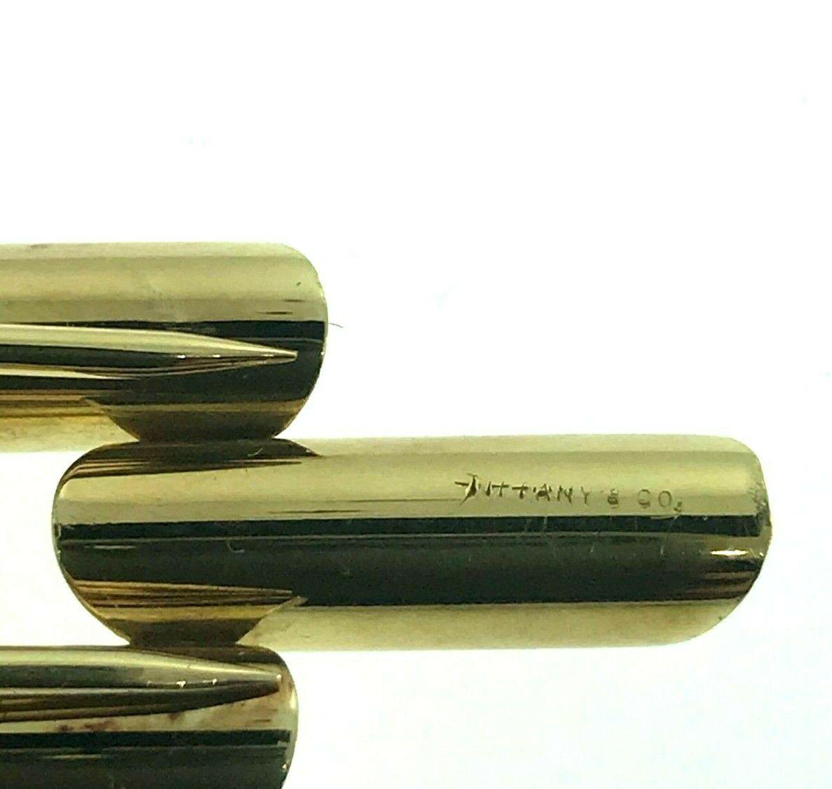 Tiffany & Co. Retro Art Deco Yellow Gold Bullet Clip Brooch 1