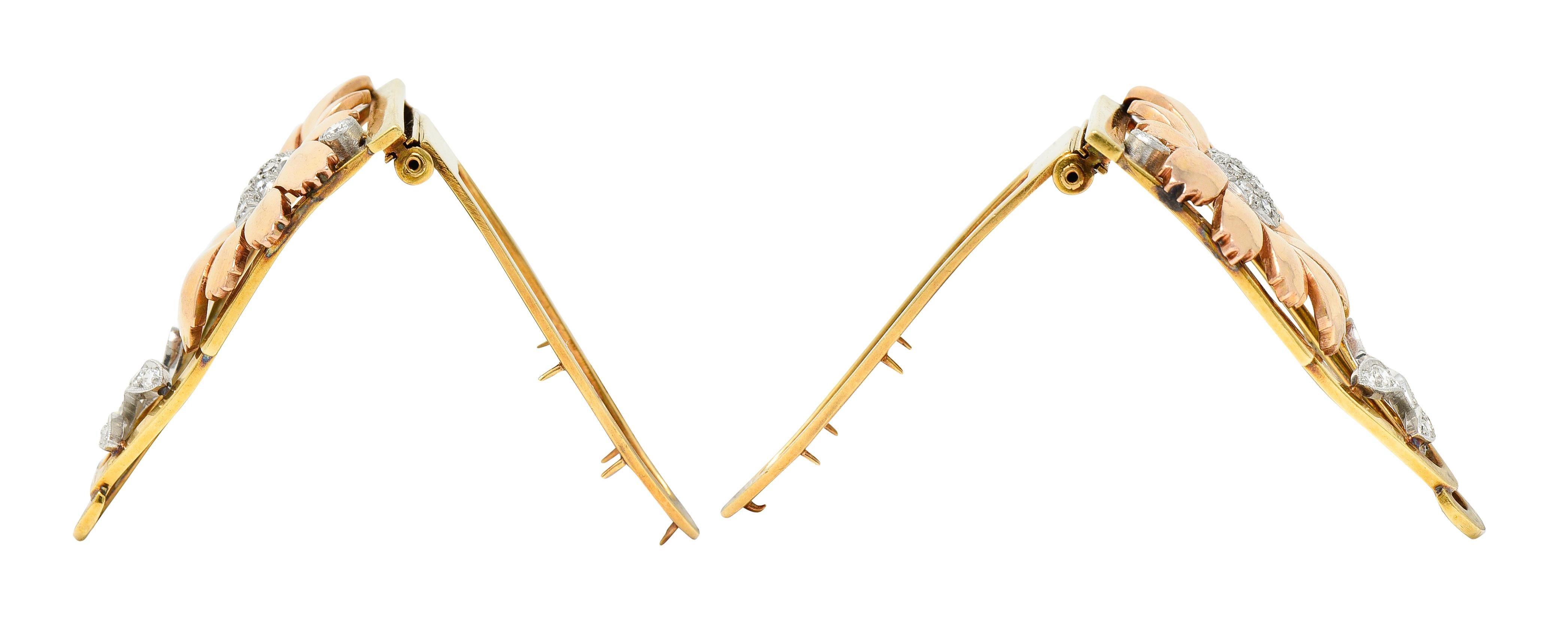 Alligator style clip brooches open on a hinge

Featuring a dimensionally formed flower with rose gold petals

And areas of platinum set with single and transitional cut diamonds

Weighing in total approximately 0.85 carat - G/H color with VS