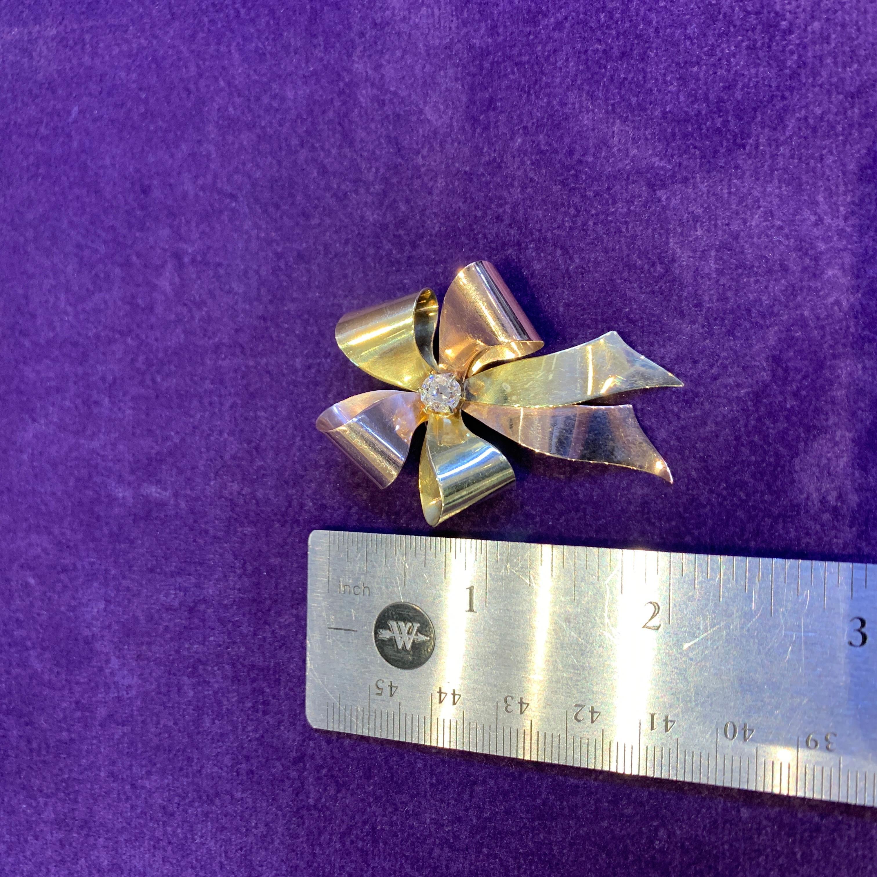 Tiffany & Co. Retro Diamond and Two Tone Gold Ribbon Brooch In Excellent Condition For Sale In New York, NY
