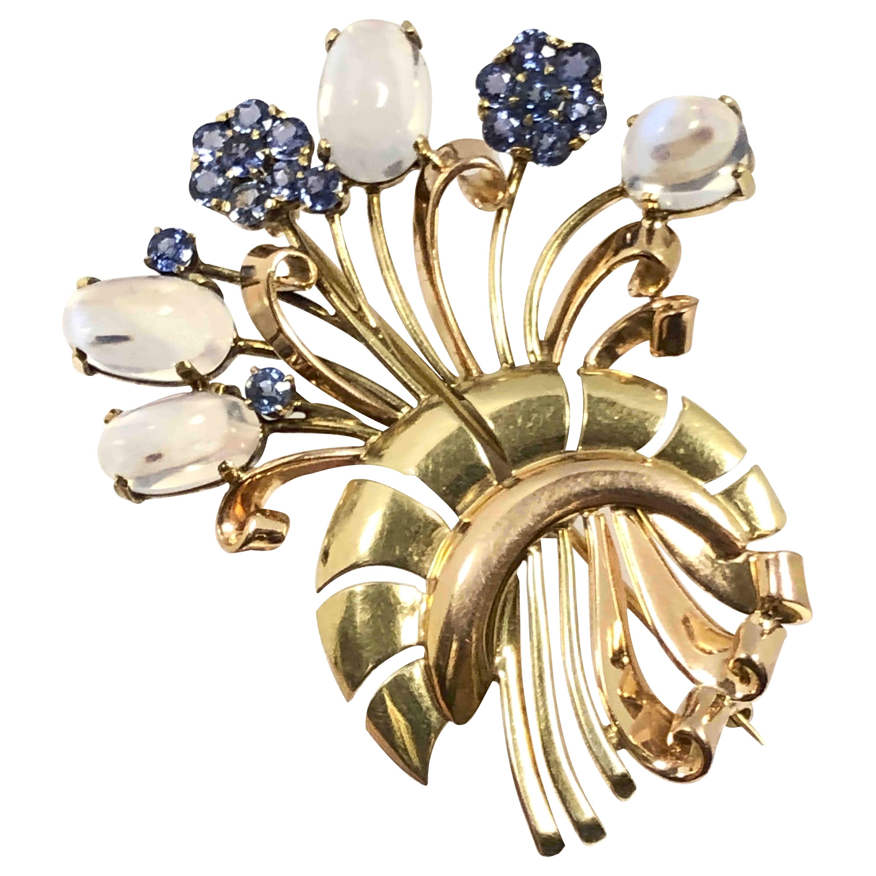 Tiffany & Co. Broche retro de oro con piedra de luna y zafiro