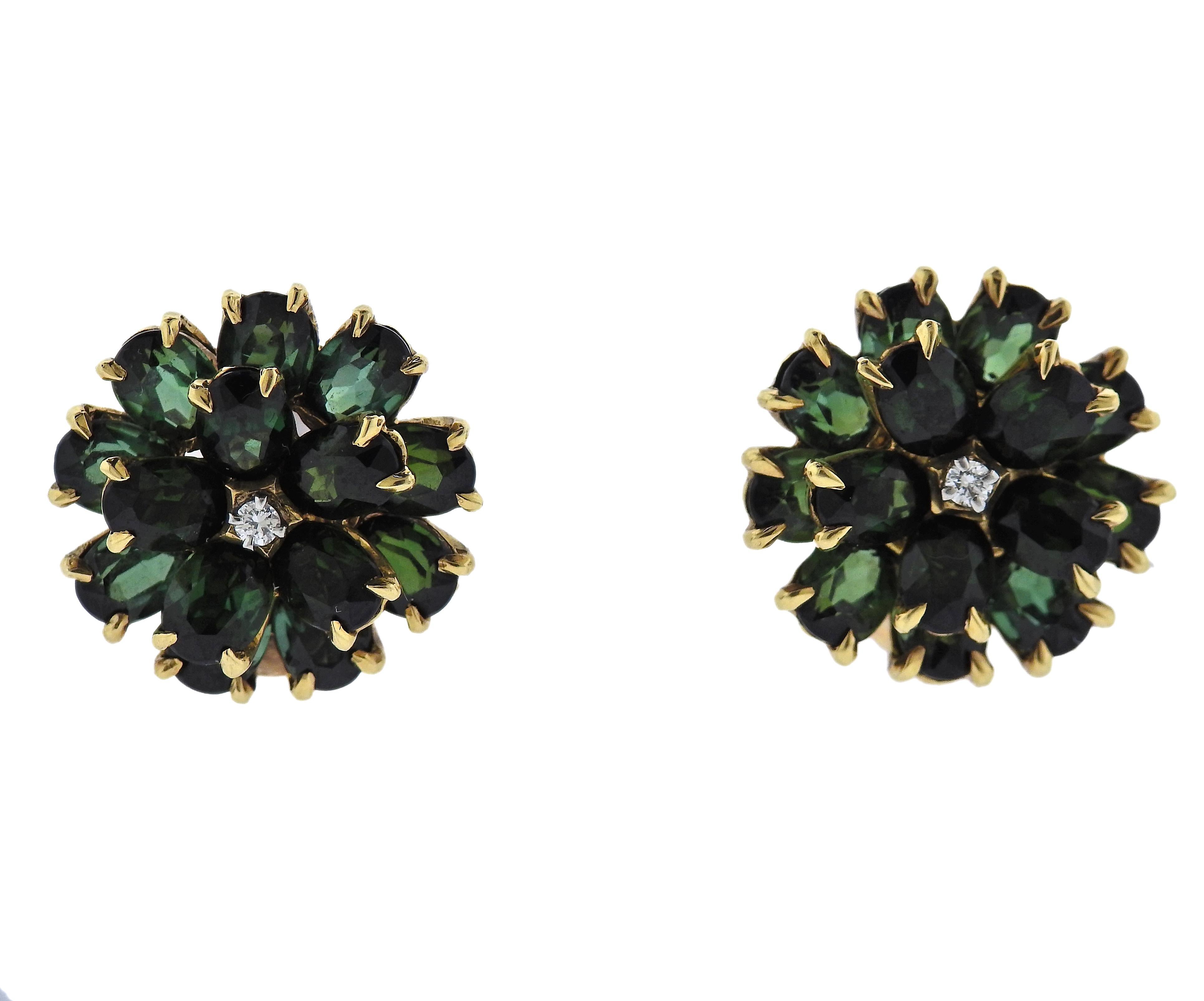 Retro 14k gold flower earrings by Tiffany & Co, with green tourmalines and approx. 0.06ctw G/VS diamonds in the center. Earrings are 20mm in diameter. Marked: Tiffany & Co, 14kt, T.2423905. Weight - 18.2 grams.