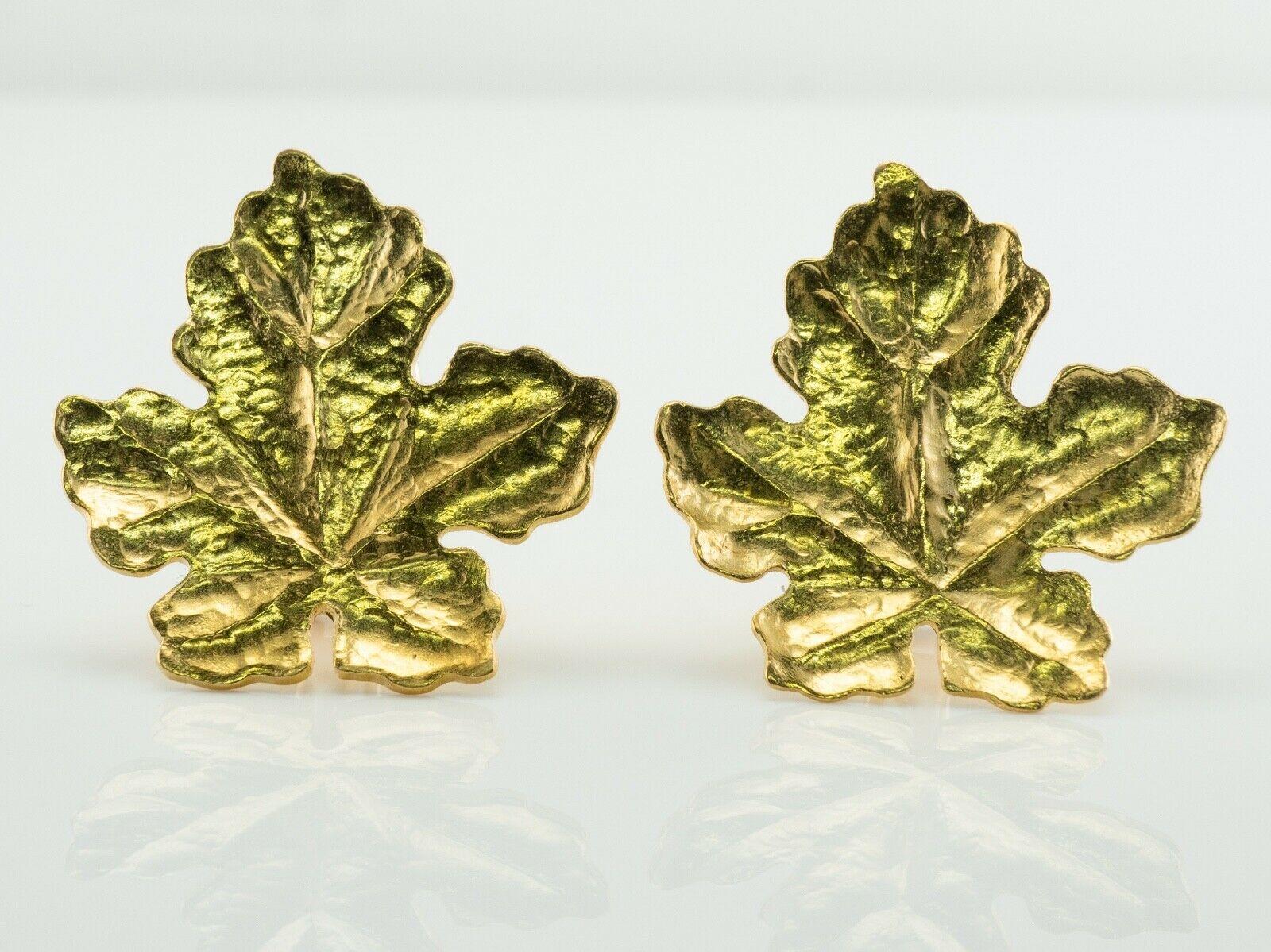 These authentic Tiffany and Co. earrings are solid 18K Yellow Gold. 
They are made in the shape of leaves. 
Each earring measures 25mm (1