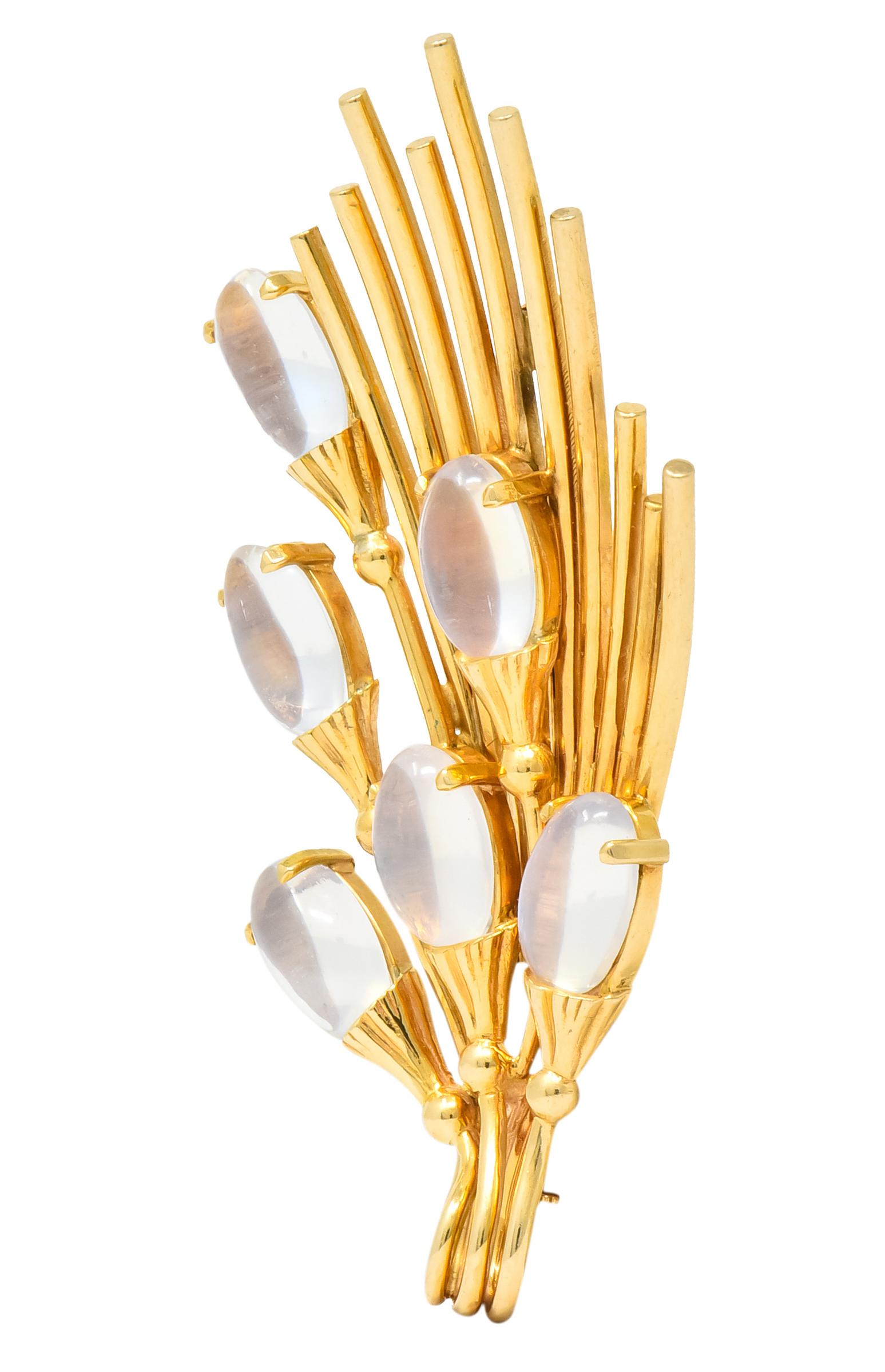 Brooch designed as cattail motif with linear stems that wind and terminate into oval cabochon moonstones

Moonstones measure approximately 9.5 x 6.0 mm, transparent with moderate white adularescence

Completed by pin stem and locking closure

Fully