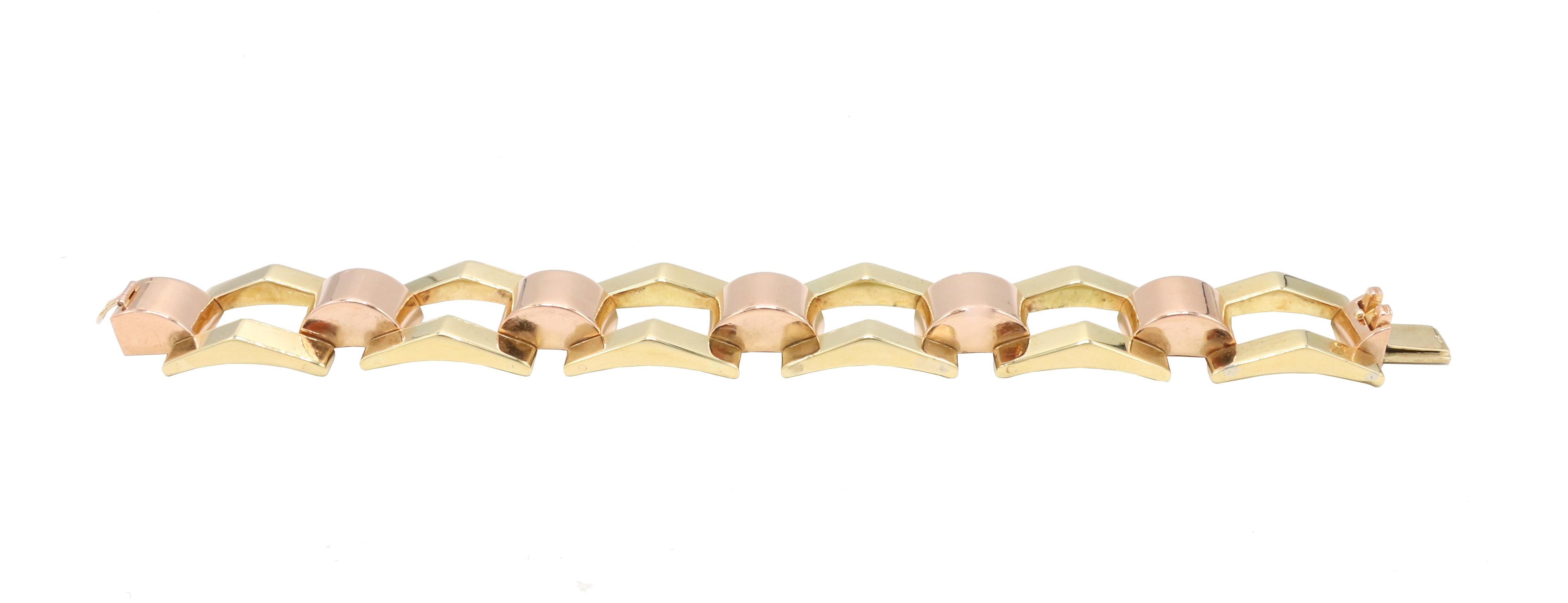 Tiffany & Co. Retro Pink & Yellow 14 Karat Gold Link Bracelet 
Metal: 14k yellow gold
Weight: 57.6 grams
Length: 7 inches
Width: 21.5mm
Signed: Tiffany & Co. 14K
