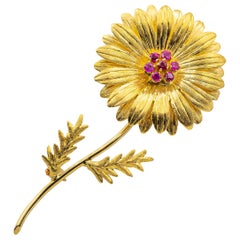 Tiffany & Co. Retro Ruby Sunflower 18 Karat Gold Brooch, circa 1970s