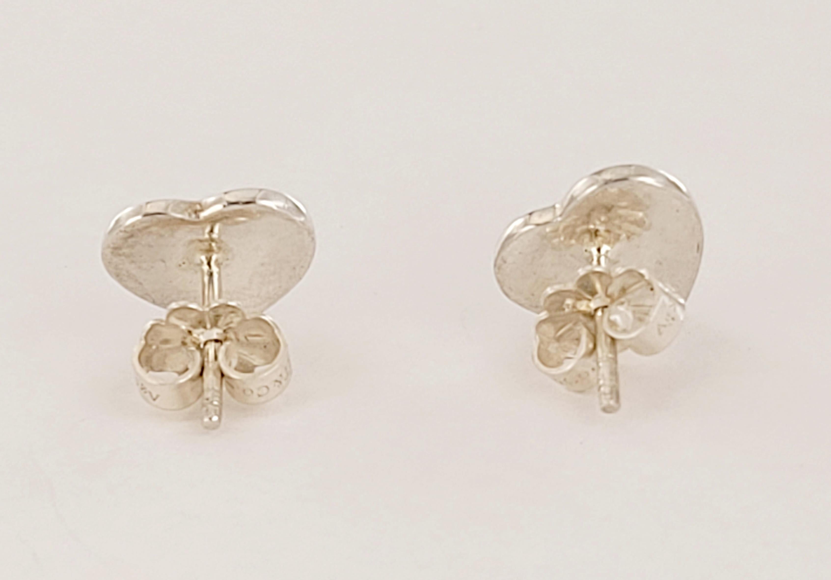 Tiffany & Co Return to
Mini Heart Stud Earrings
Material Sterling Silver925
Dimension: 9.1mm X 9.7mm. 
Weight: 2.3gm in total
Condition Pre-owned, there is slightly signs of wear
Comes with Tiffany Pouch
Retail price$ 285