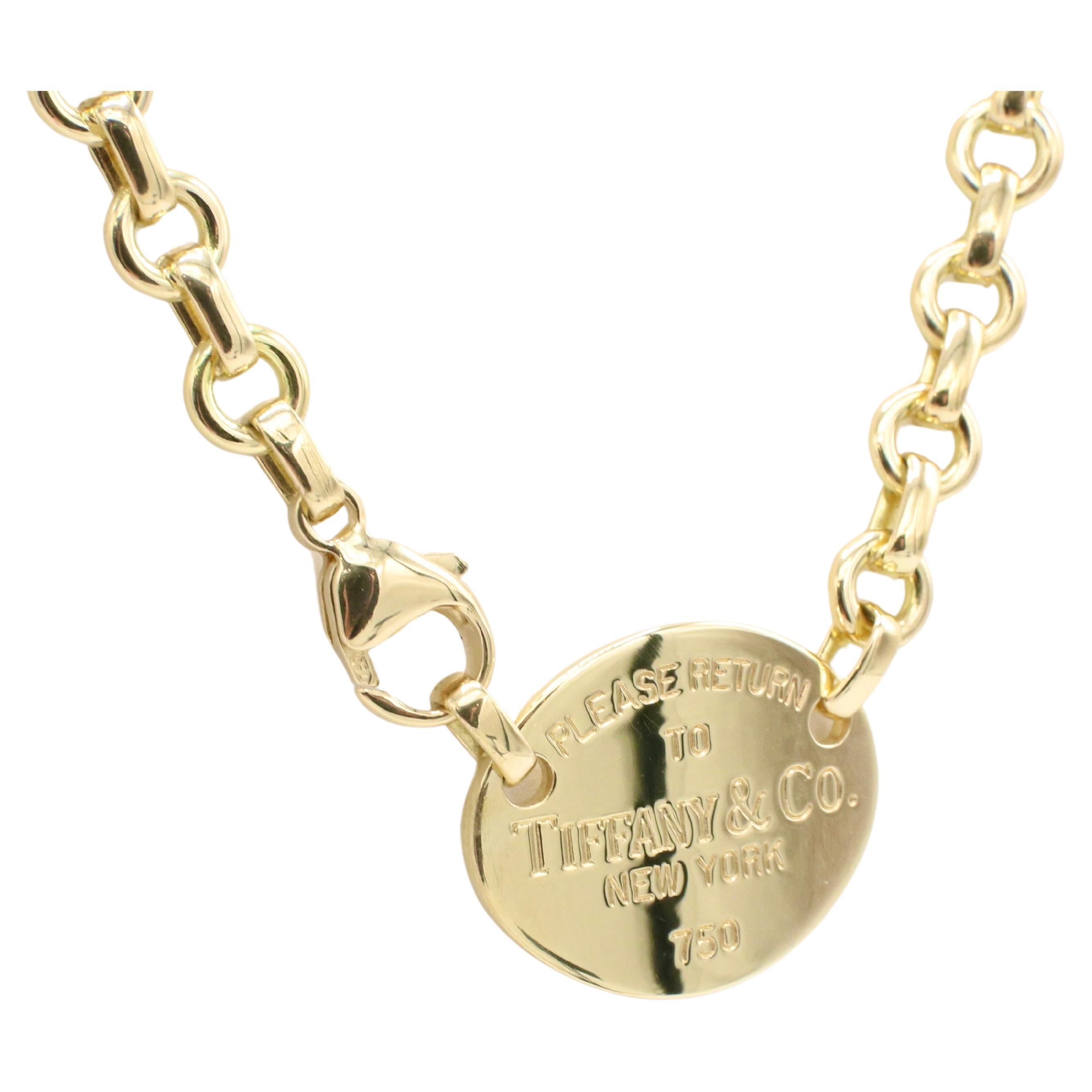 Tiffany & Co. Return To Tiffany 18 Karat Yellow Gold Chain Link Necklace
Metal: 18k yellow gold
Weight: 39.37 grams
Length: 16 inches
Tag: 22.5 x 18mm
Signed: PLEASE RETURN TO TIFFANY & CO. NEW YORK 750 
