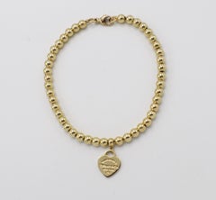 Tiffany & Co. Return to Tiffany 18 Karat Gold Mini Heart Tag Bead Bracelet