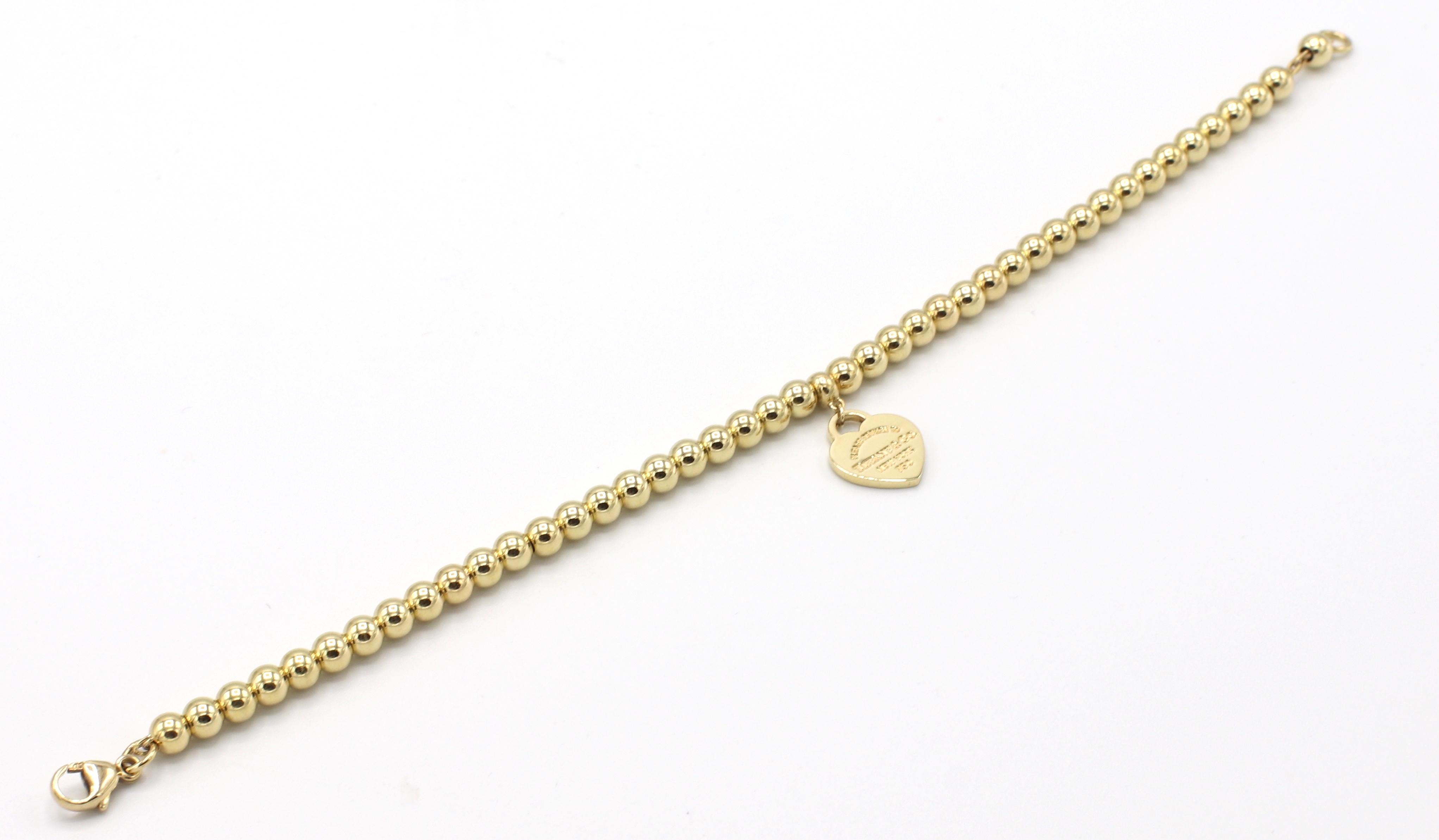 Modern Tiffany & Co. Return to Tiffany 18 Karat Gold Mini Heart Tag Bead Bracelet