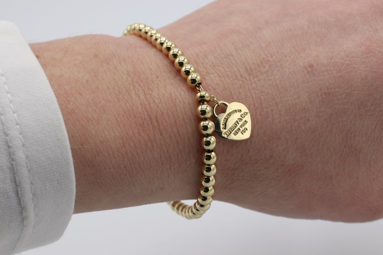 Tiffany Co. Return to Tiffany 18 Karat Gold Mini Heart Tag Bead Bracelet
