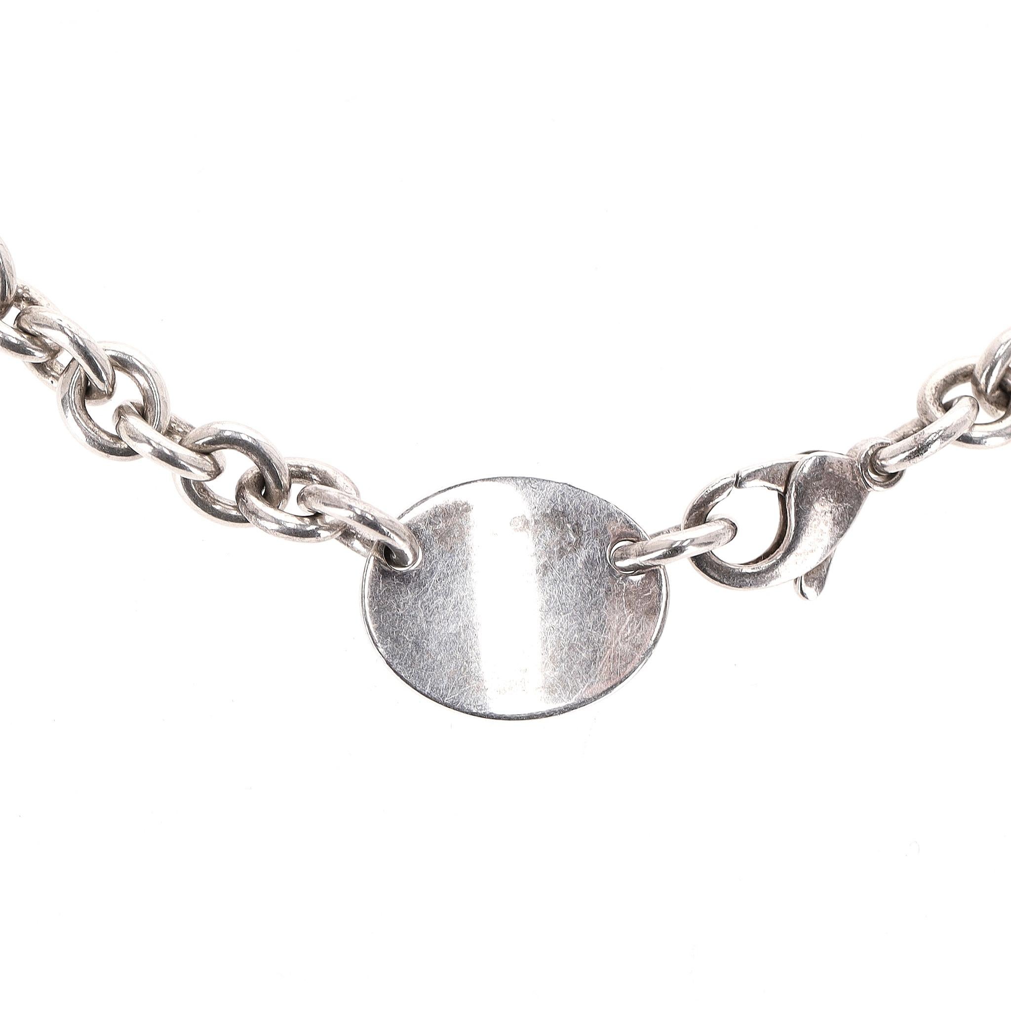 Tiffany & Co. Ritorna alla collana con medaglietta ovale in argento Sterling 925 Tiffany in vendita 1