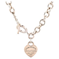 Tiffany & Co. Retour au collier ras du cou Tiffany en argent sterling avec étiquette en forme de cœur