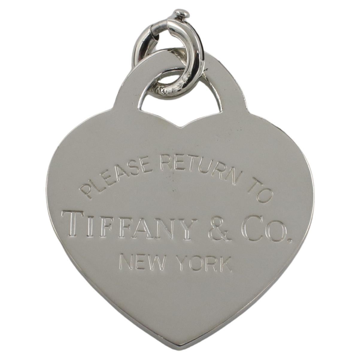 Tiffany 
Co. Return to Tiffany New York Sterling Silver Heart Charm Pendant For Sale